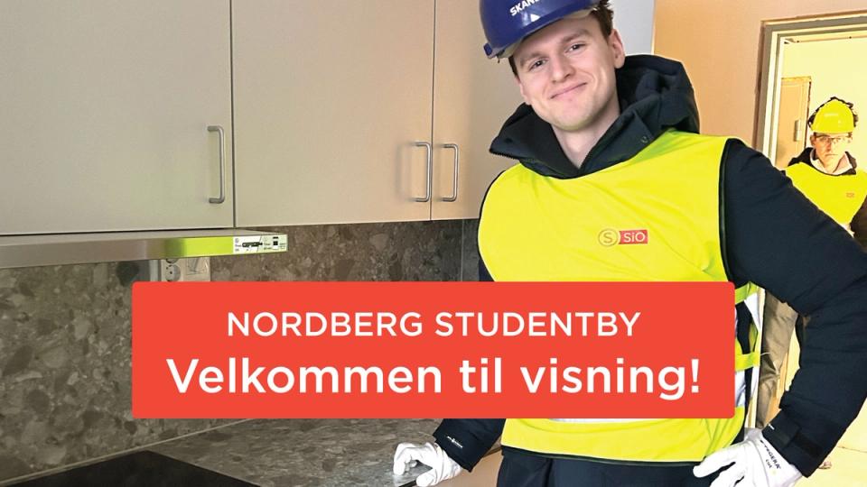 Bilde av en bygningarbeider på kjøkkenet