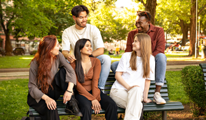 Group gathered on a park bench