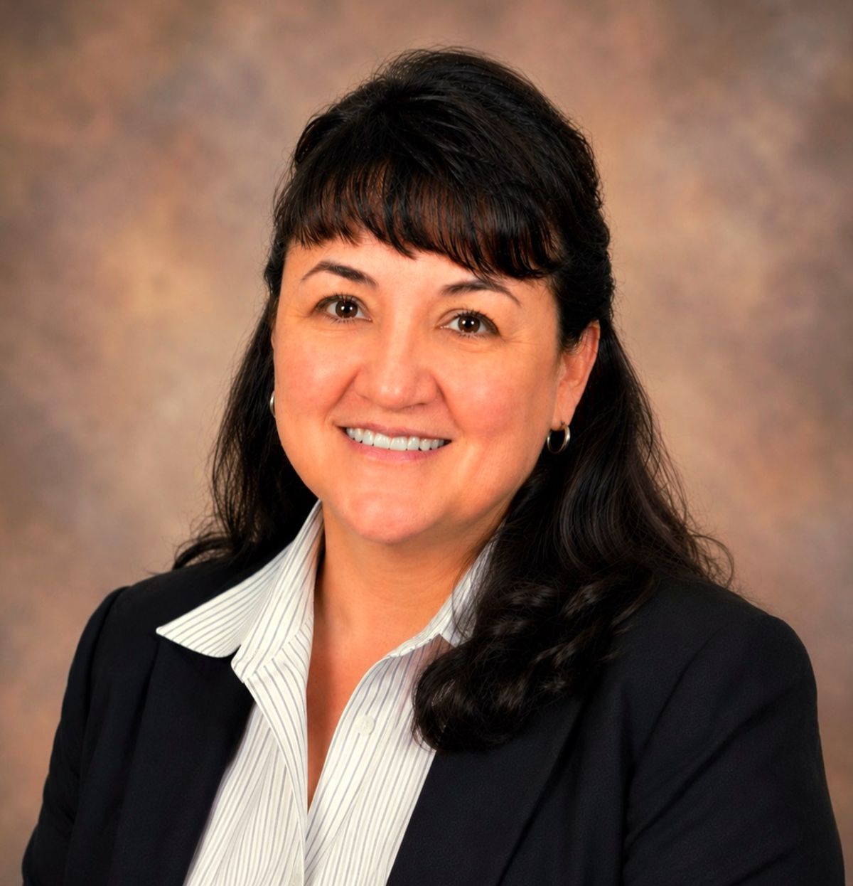 Portrait of Mary Lynne-Billy Old Coyote, Chief Executive Officer of White Earth Tribal Health Systems.