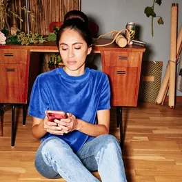 A girl checking the phone