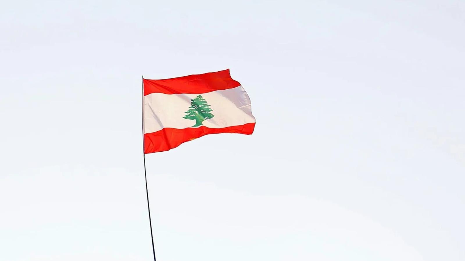 Flag of the Republic of Lebanon featuring the cedar tree on red and white bands.