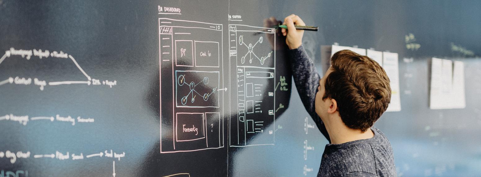 Employee using blackboard