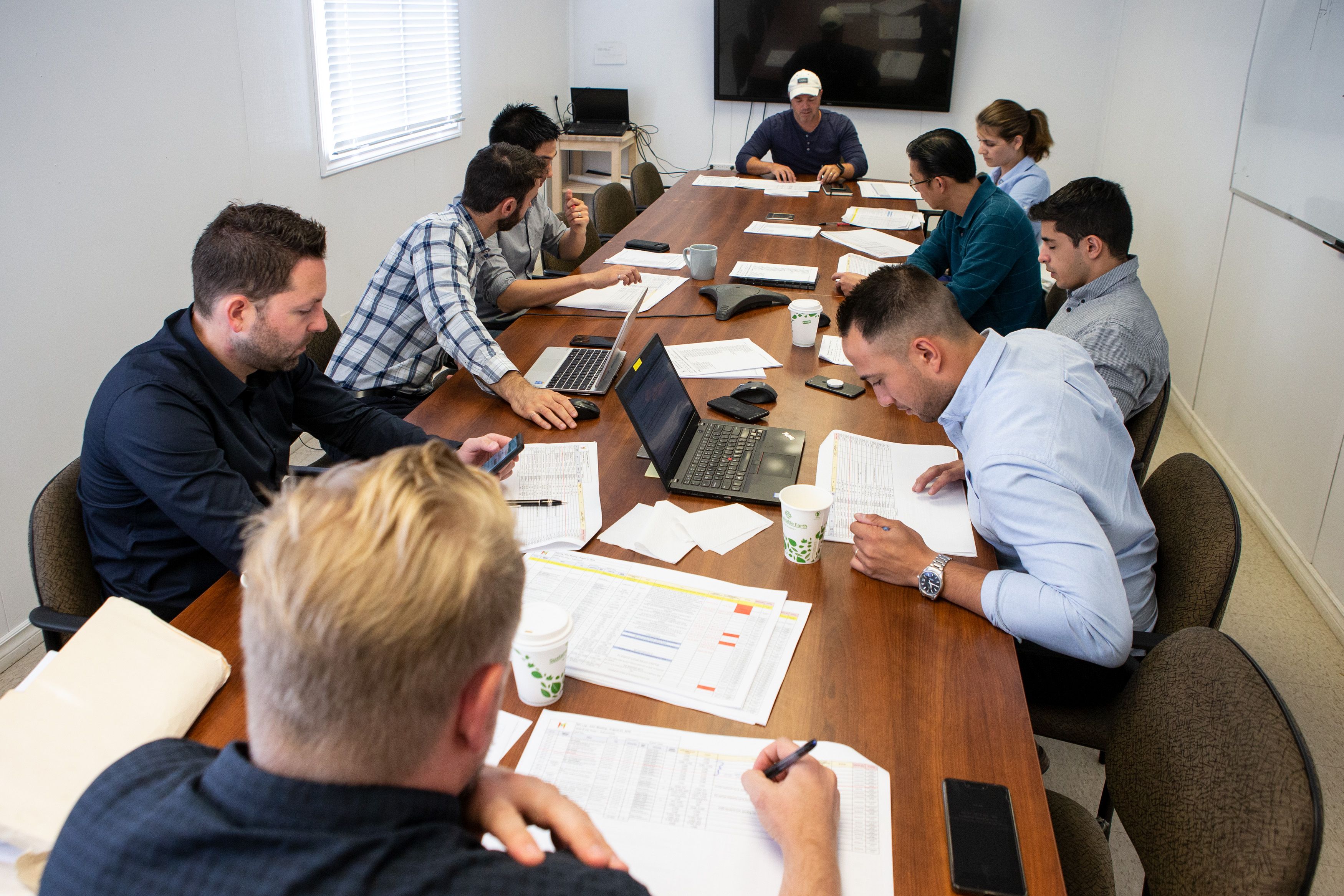 Employees working in meeting room