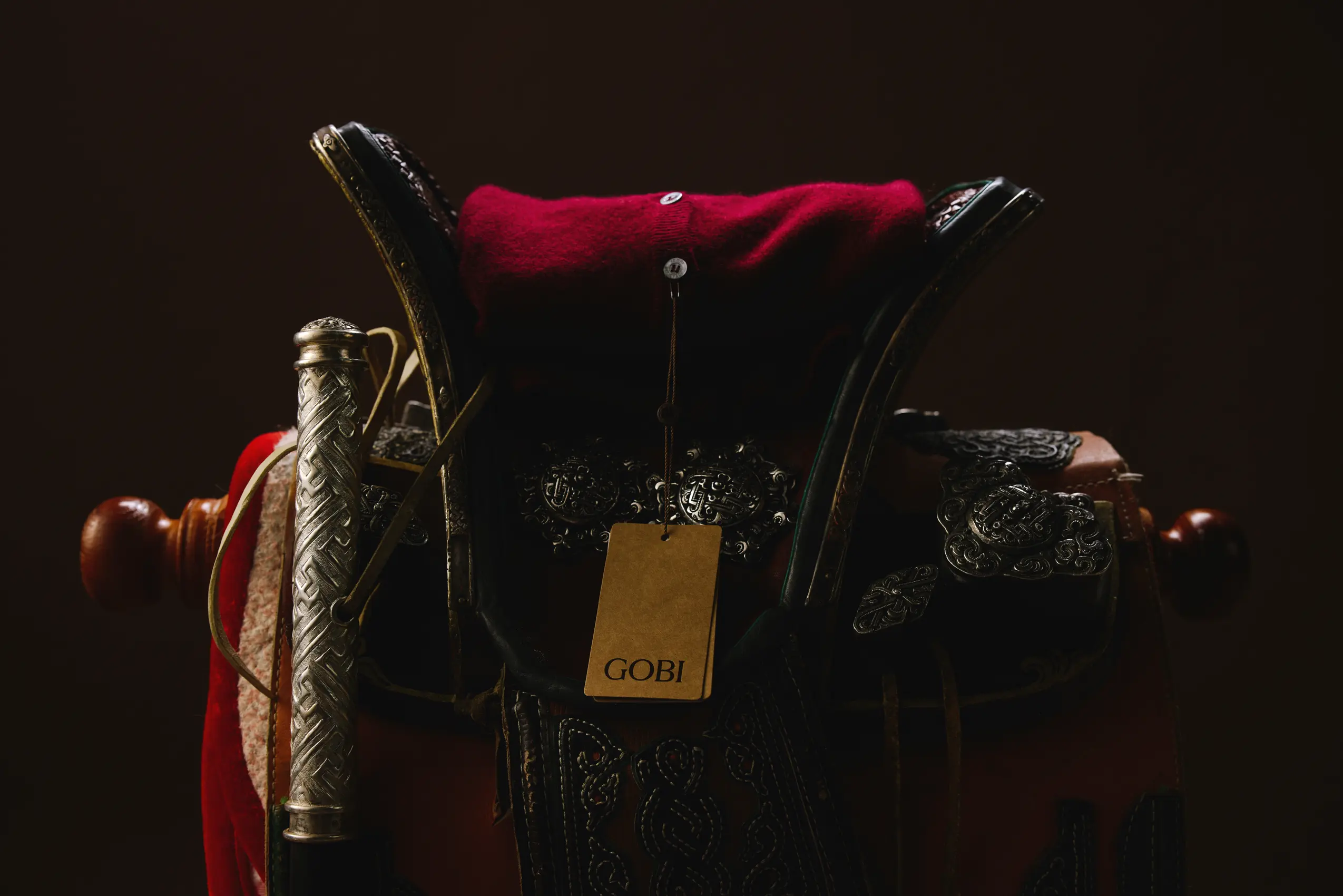 Cashmere cardigan on Mongolian horse saddle | GOBI Cashmere