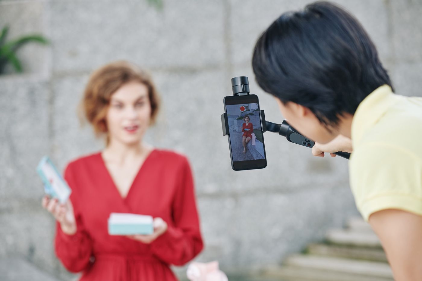 A video shoot of a woman and beauty products