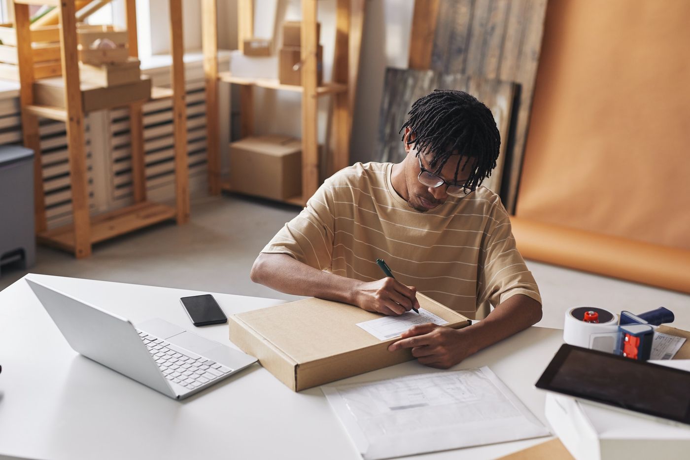 How to sell on Wayfair: Man working at warehouse