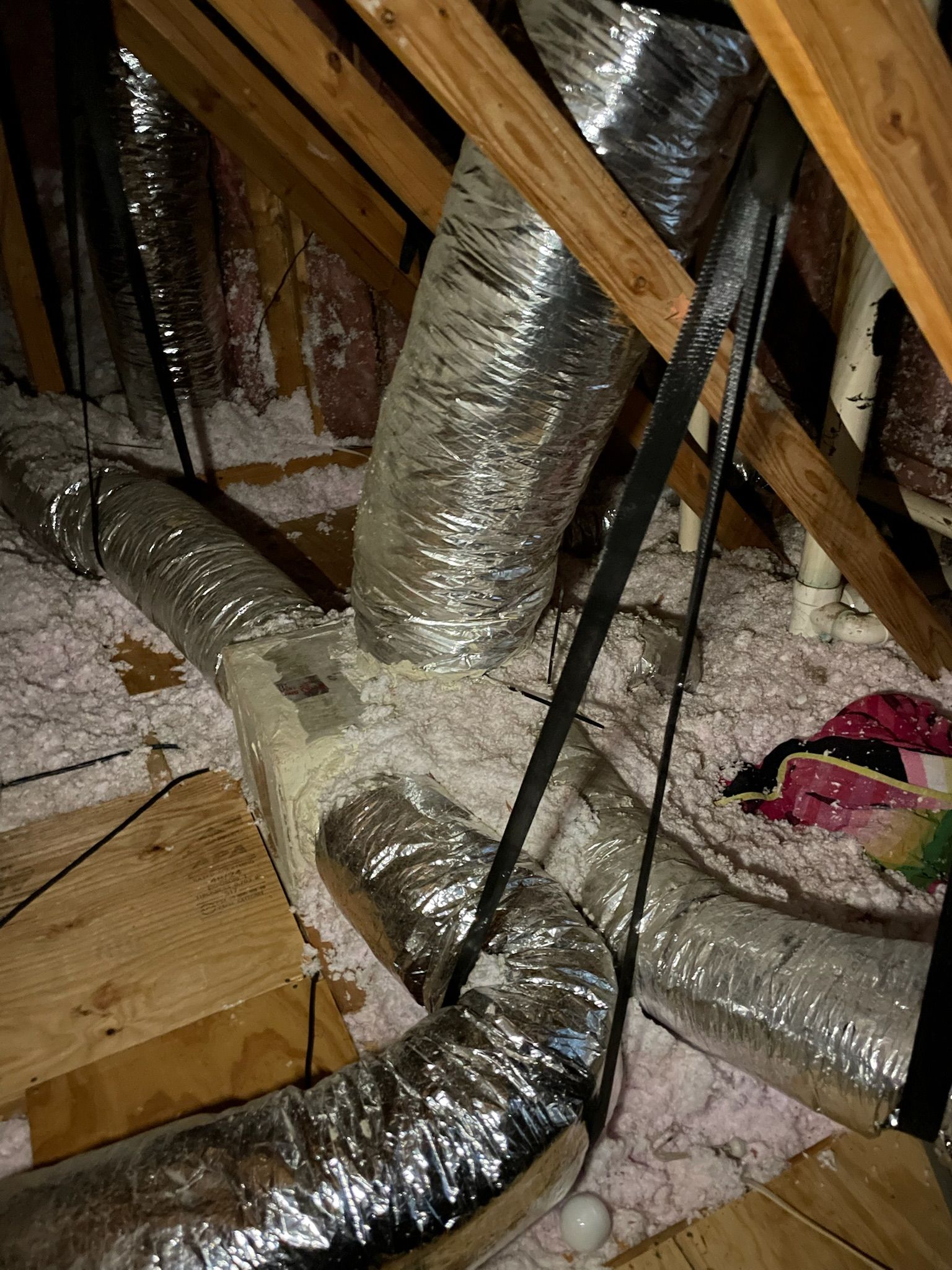 attic-insulated-flex-ductwork-blown-in-insulation.jpeg