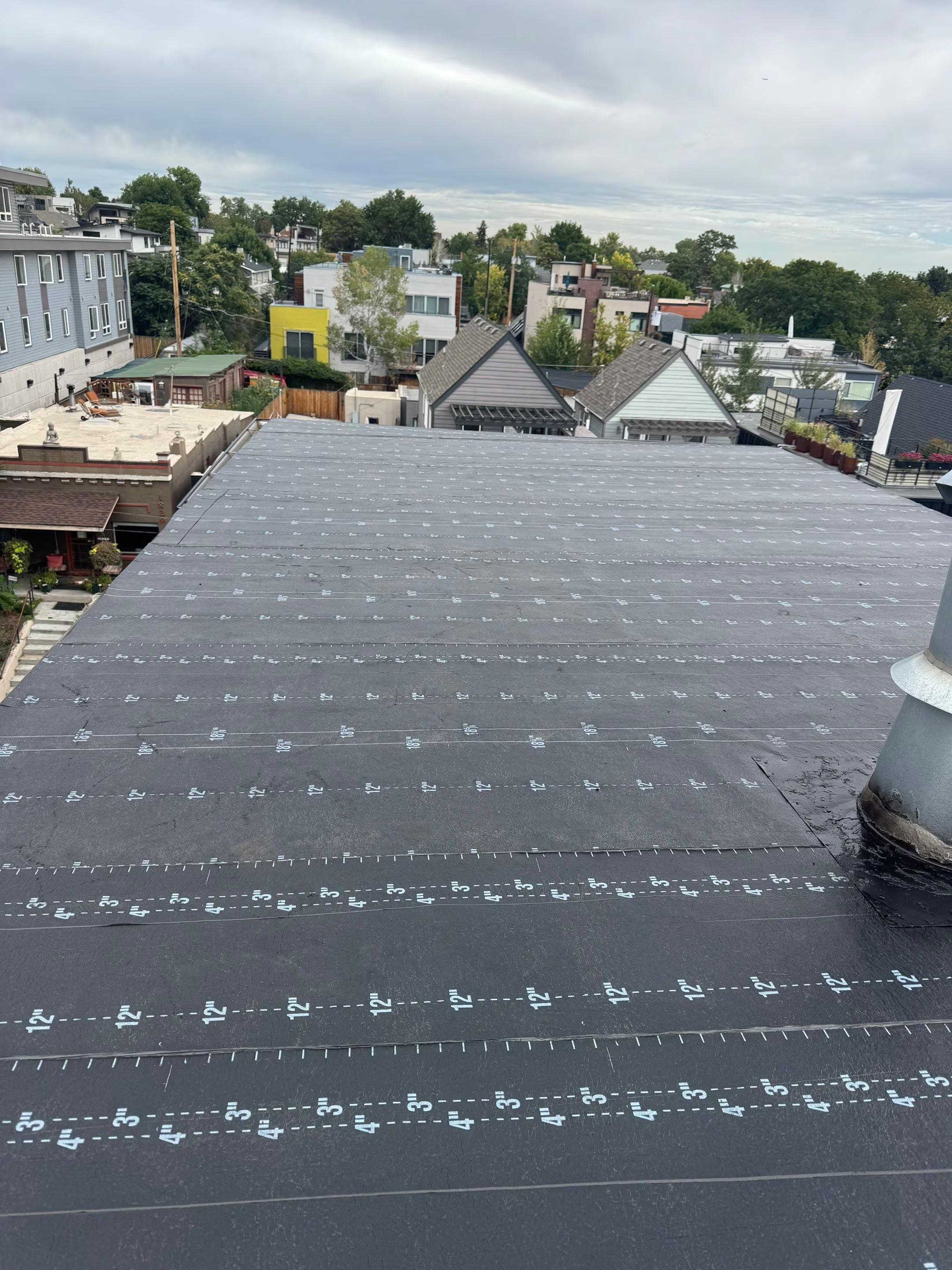 Low-Slope Roof Replacement on Multi-Family Building Work Image in Denver, CO