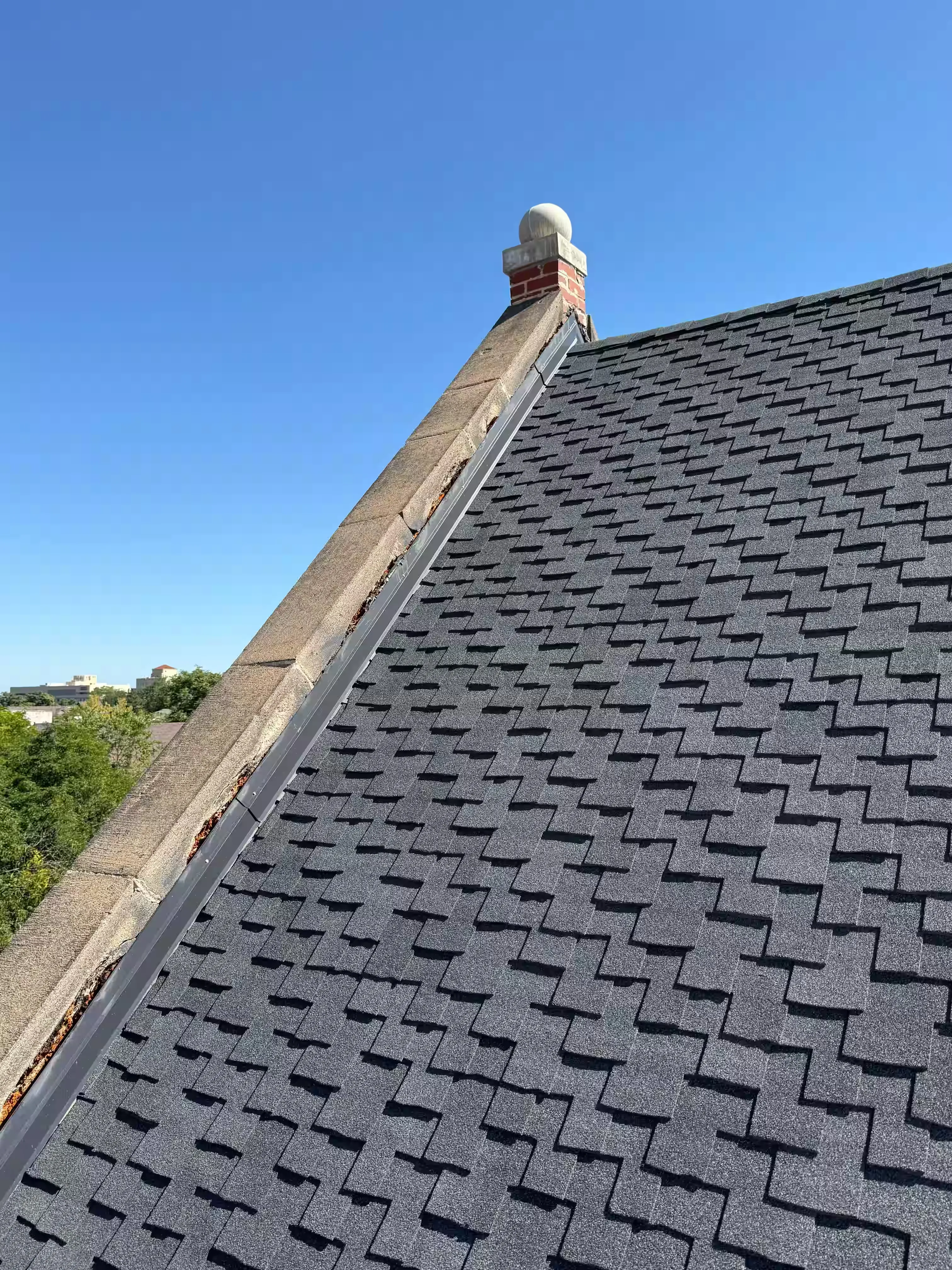 Multi-Family Building Roof Repair Work Image in Denver, CO
