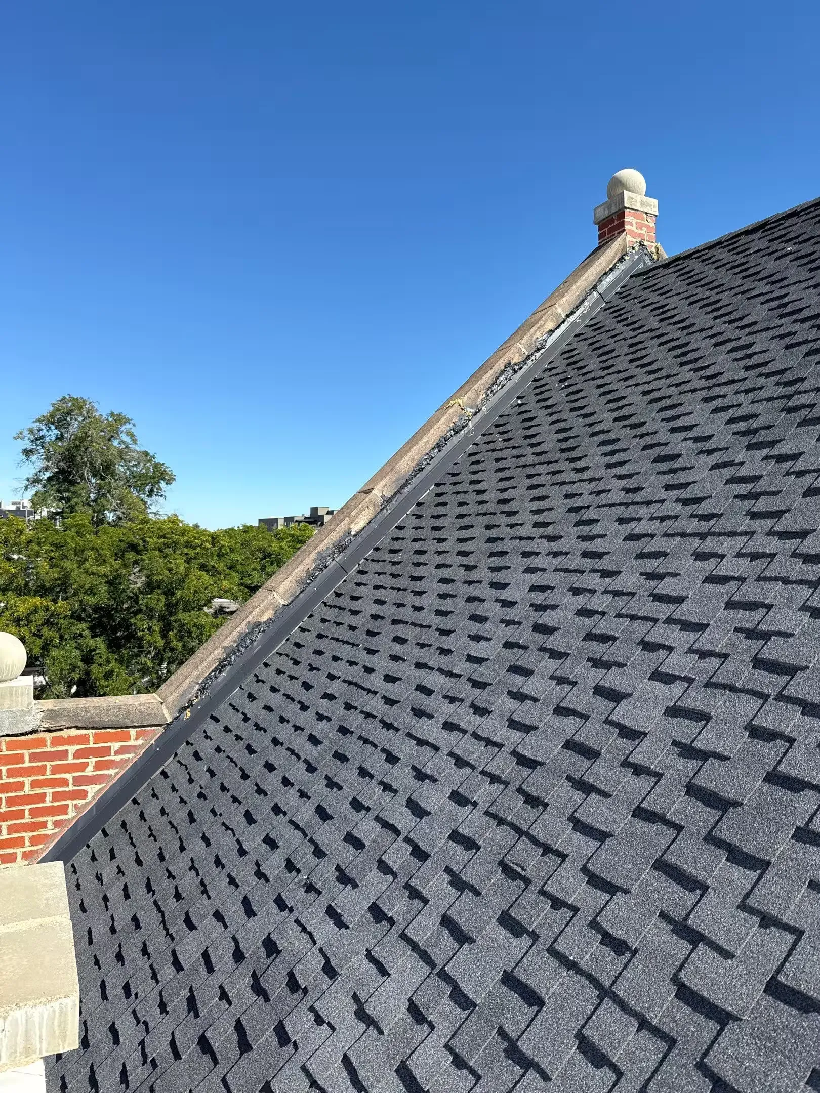 Multi-Family Building Roof Repair Work Image in Denver, CO