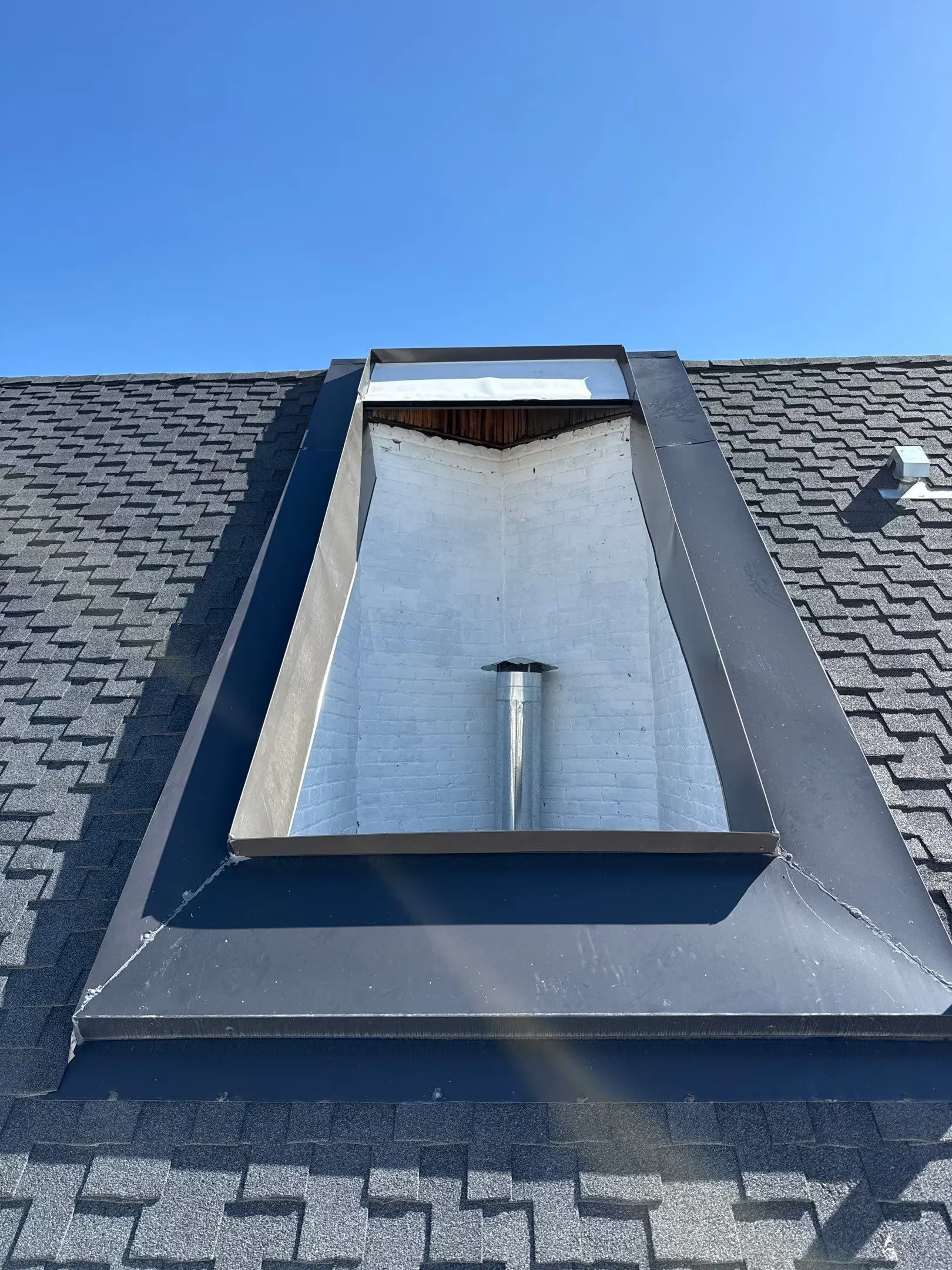 Multi-Family Building Roof Repair Work Image in Denver, CO