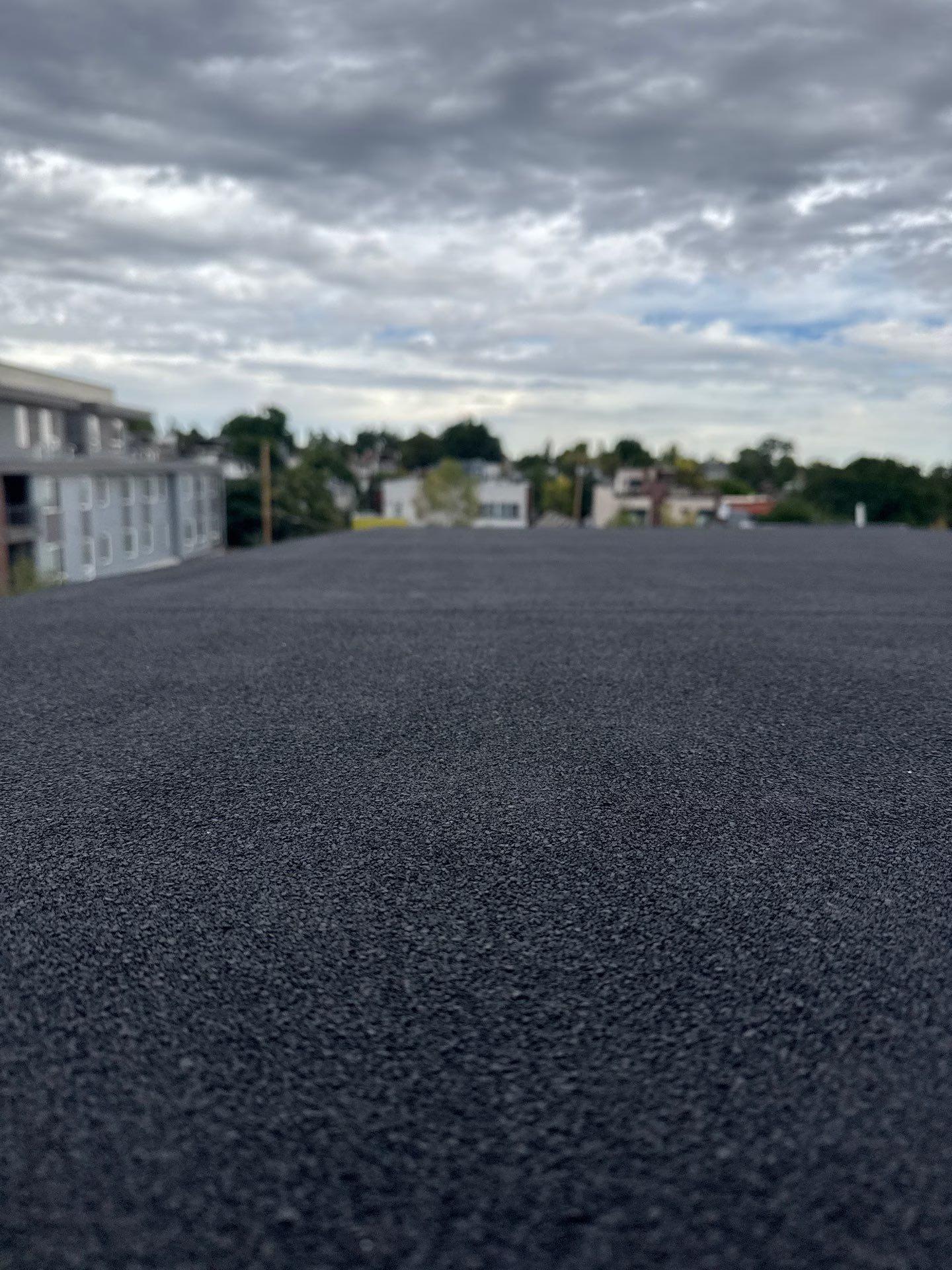 Low-Slope Roof Replacement on Multi-Family Building Work Image in Denver, CO