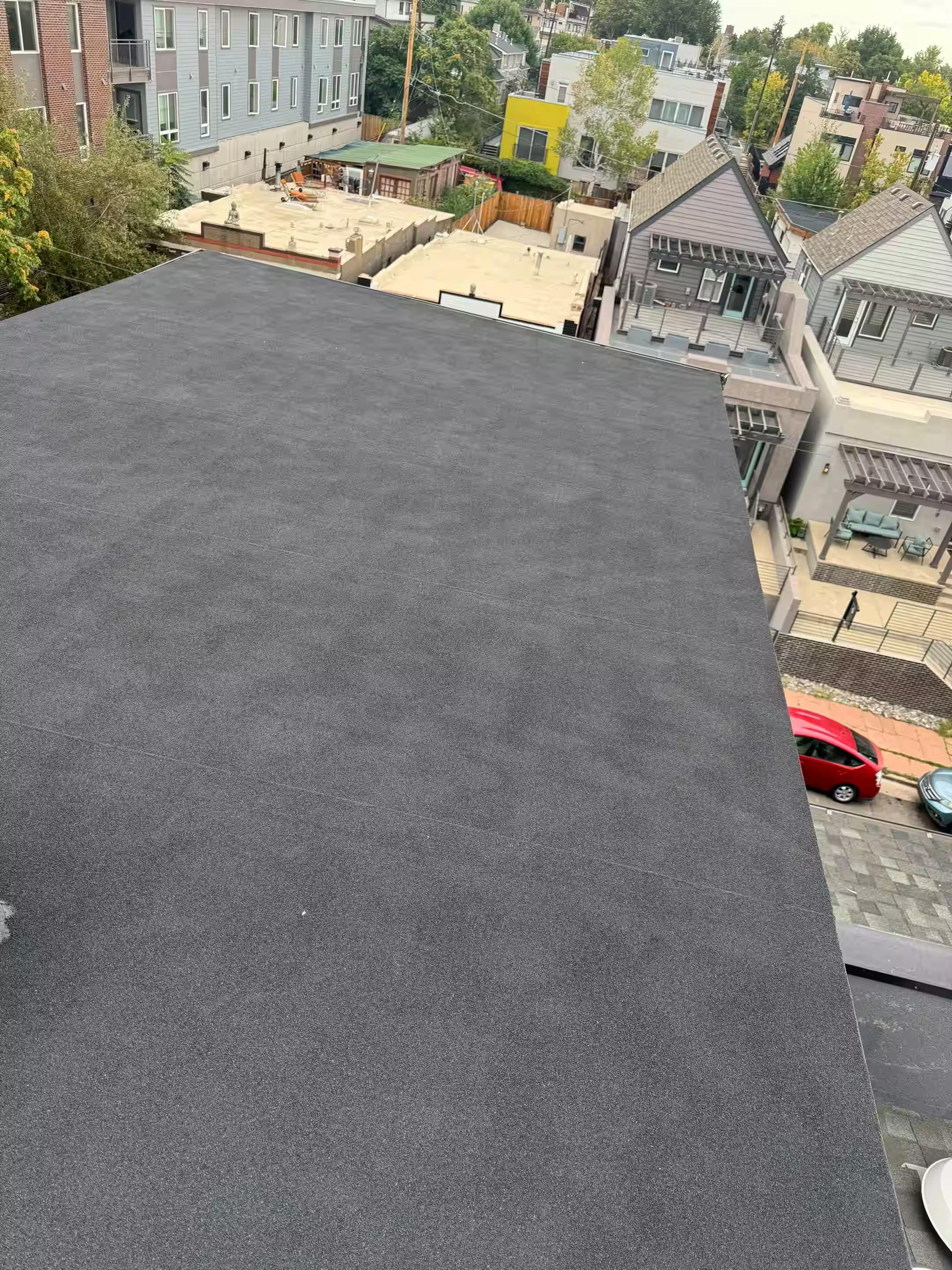 Low-Slope Roof Replacement on Multi-Family Building Work Image in Denver, CO