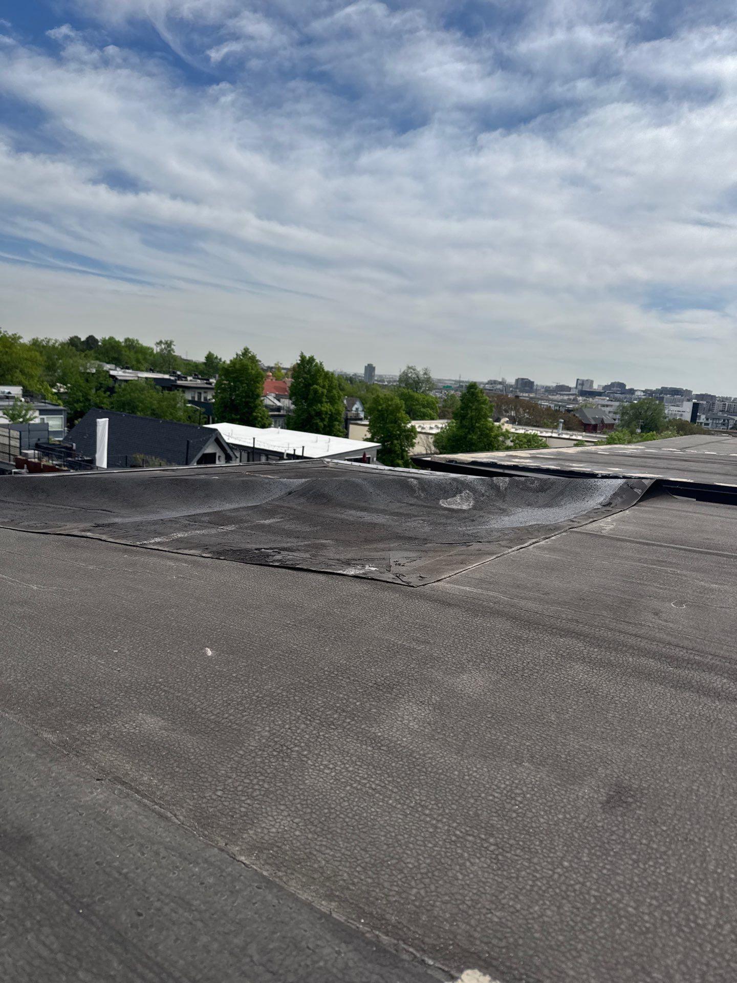 Low-Slope Roof Replacement on Multi-Family Building Work Image in Denver, CO