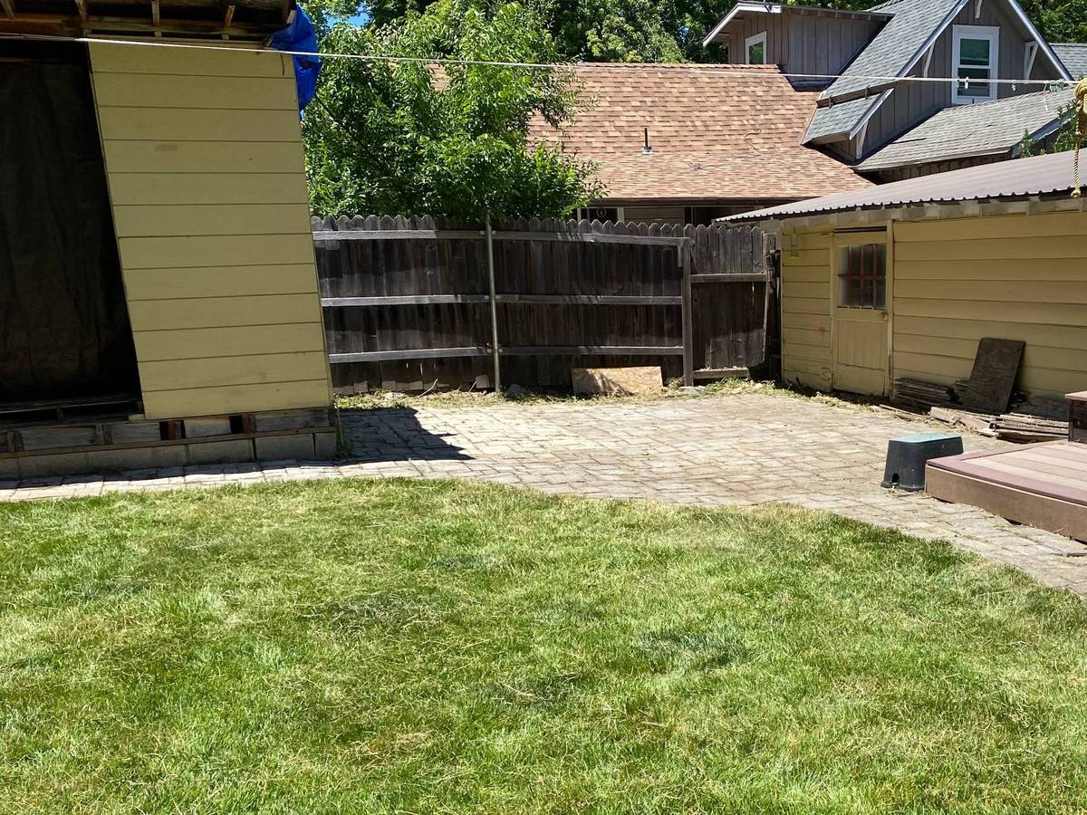 Overgrown Quincy lawn before and after our mowing, after