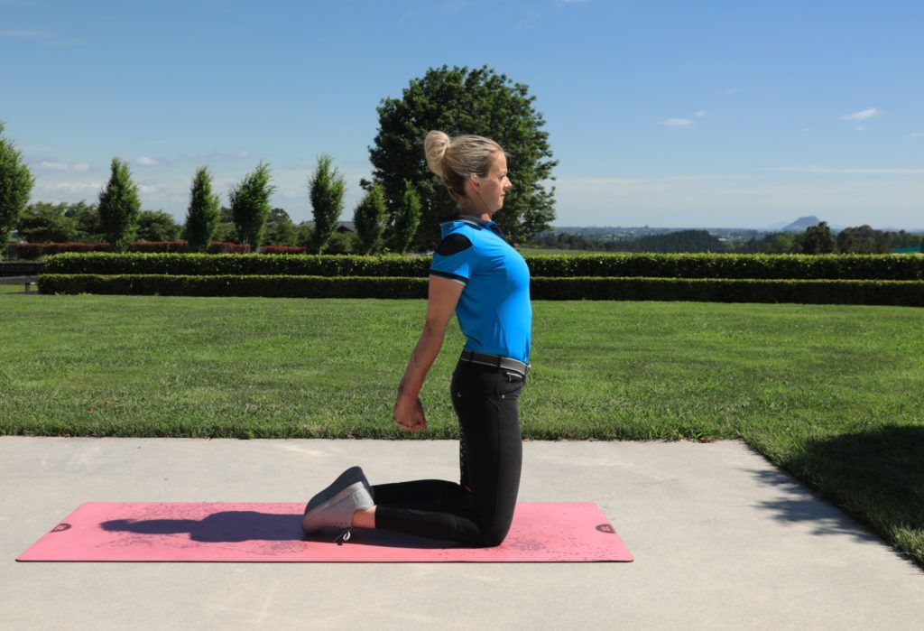 Dressage rider stretches