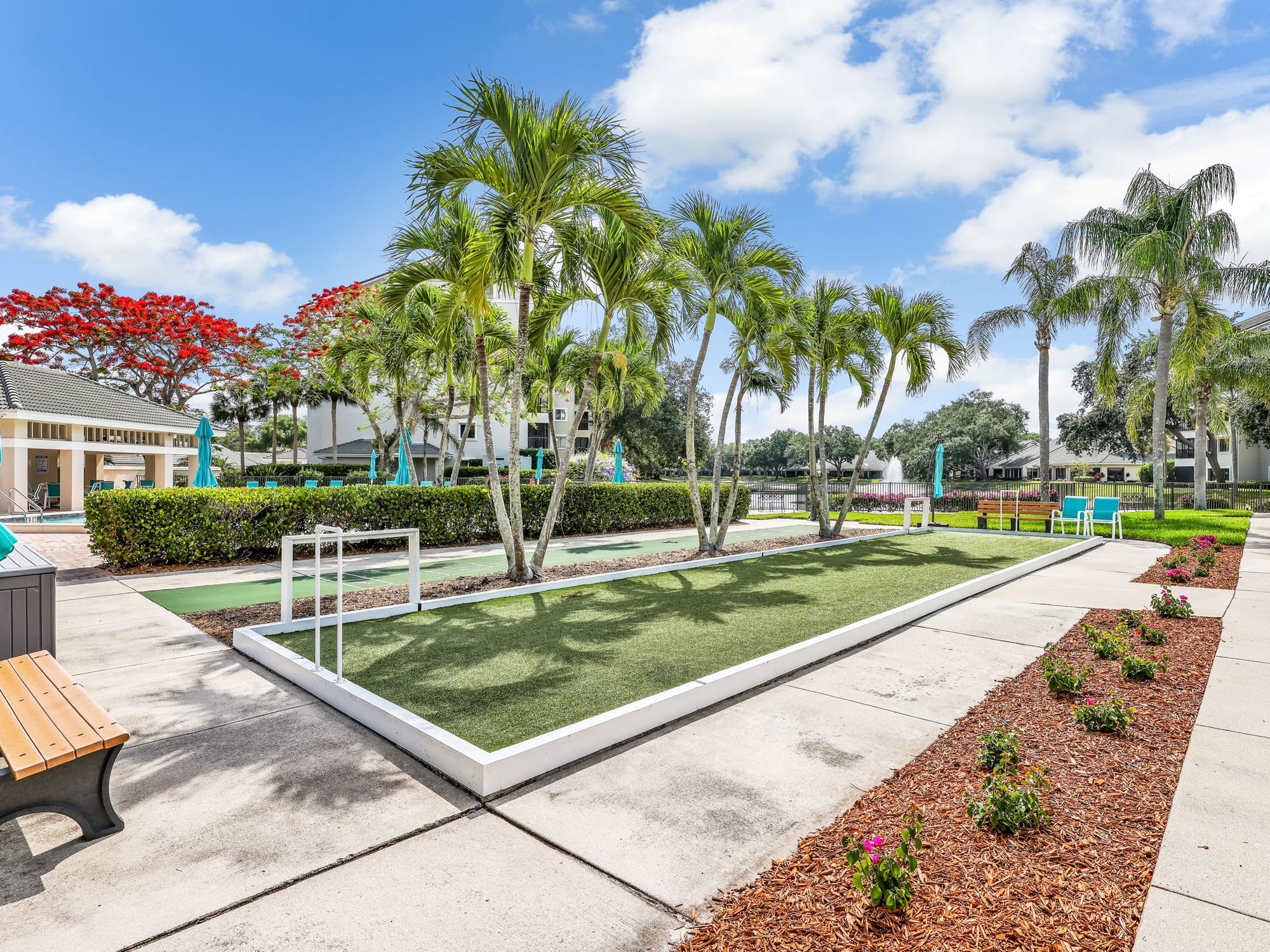The bocce and shuffleboard courts along Arbor Lake