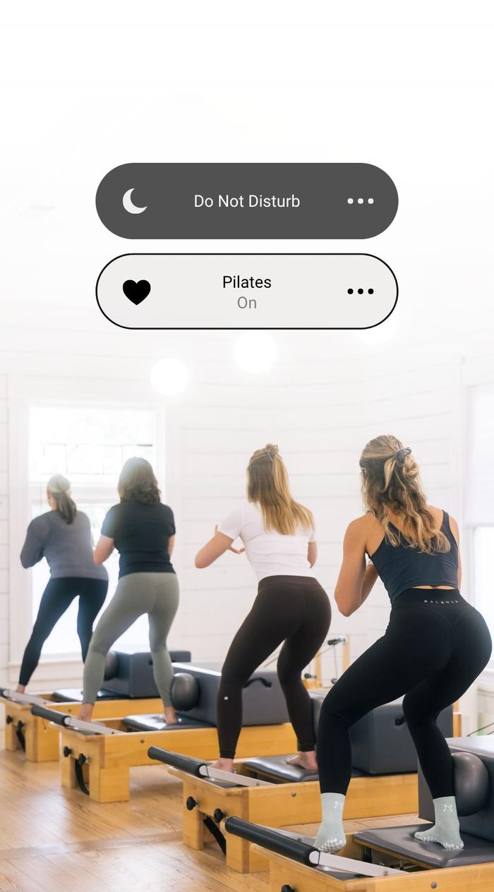 Ad for women doing Pilates in a class on reformers with an overlay of a Do Not Disturb button.