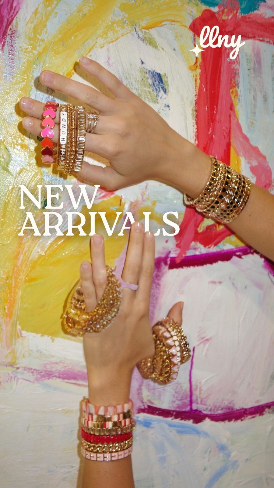 Ad for La Lumiere New York featuring bracelets draped over wrists in front of an abstract art painting.