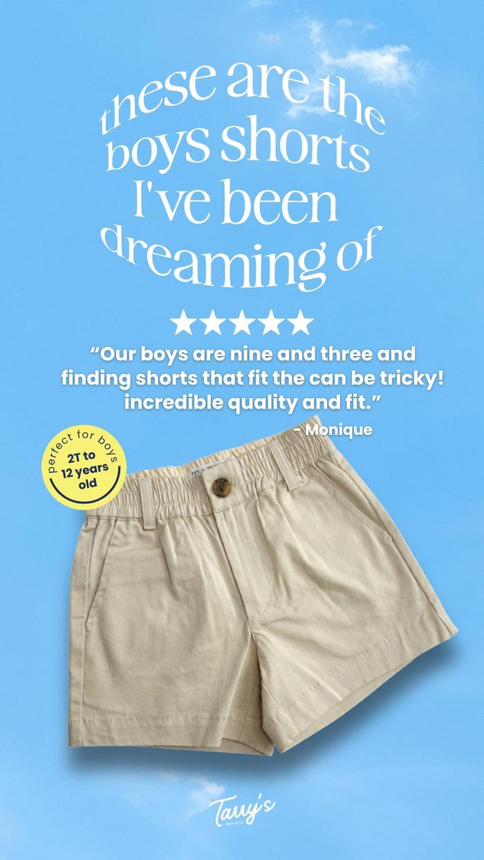 A pair of boys khaki shorts floating in blue sky background with a 5-star testimonial from a real customer.