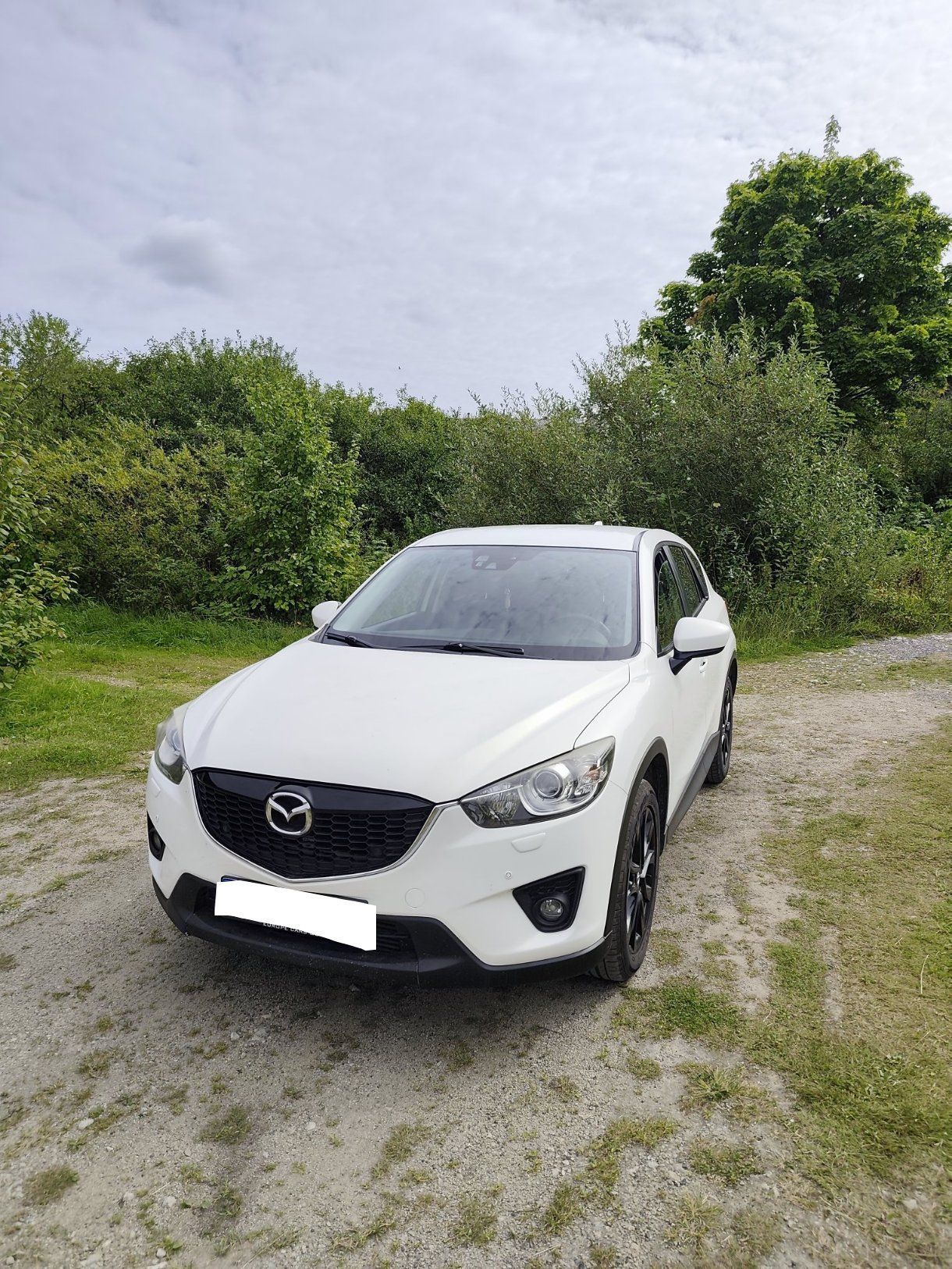 Valge Mazda CX-5 2014, millele tehti EGR lahendus