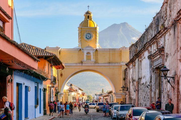 The Santa Catalina Arch in Antigua Guatemala, the Volcán de Agua beyond it