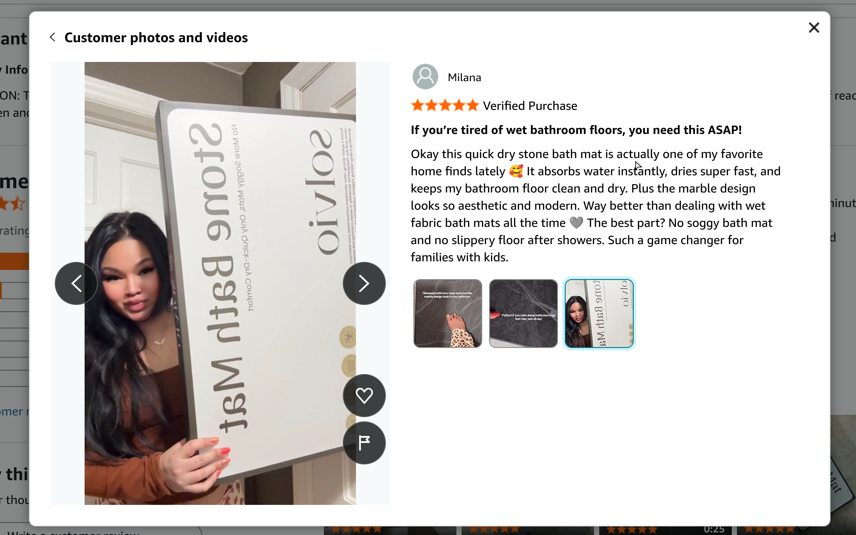 An Amazon customer-photos review of the Solvio Stone Bath Mat — a five-star Verified Purchase, the shopper holding the branded box