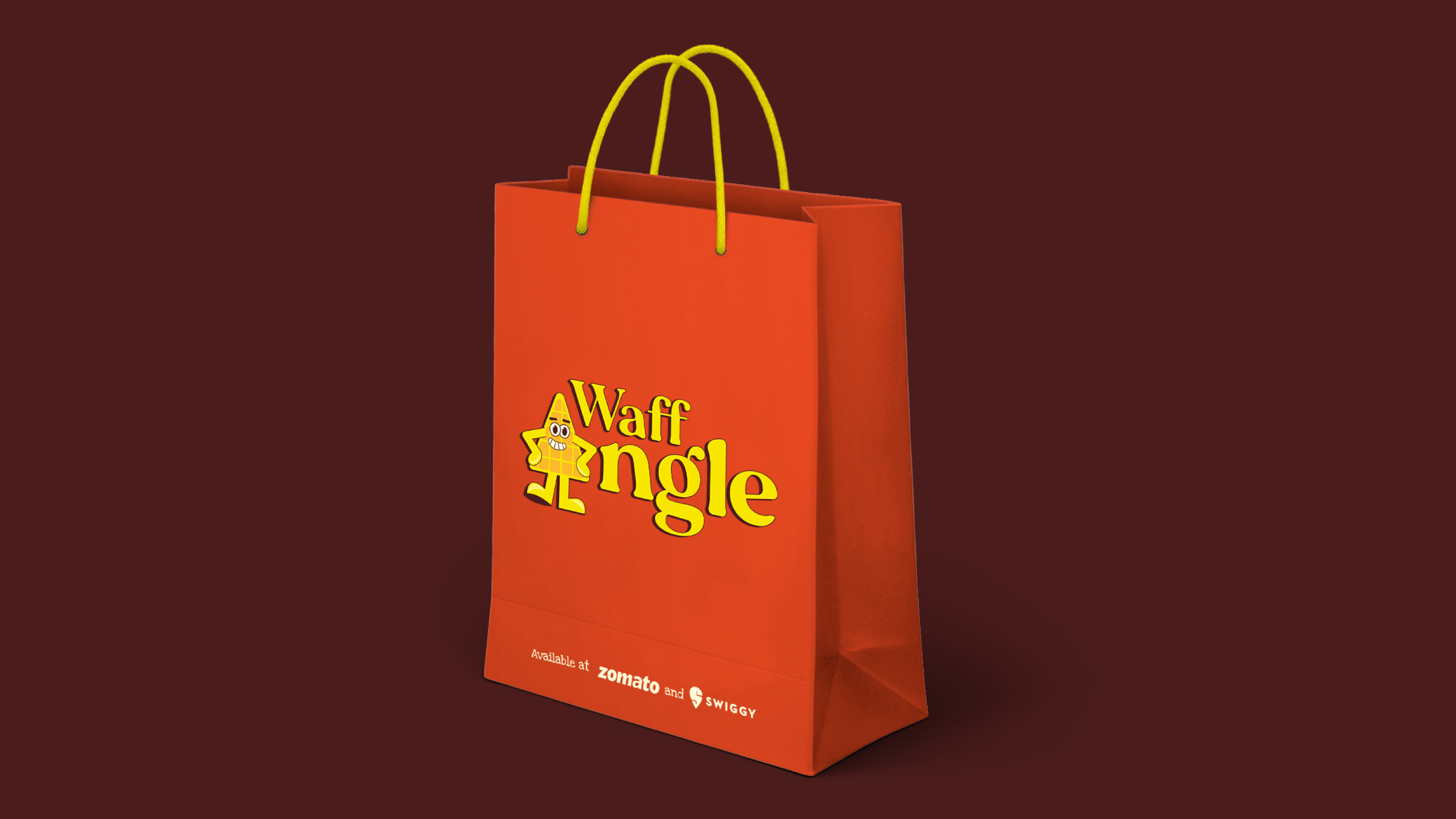Waffangle orange takeaway bag with the mascot logo on a deep brown backdrop