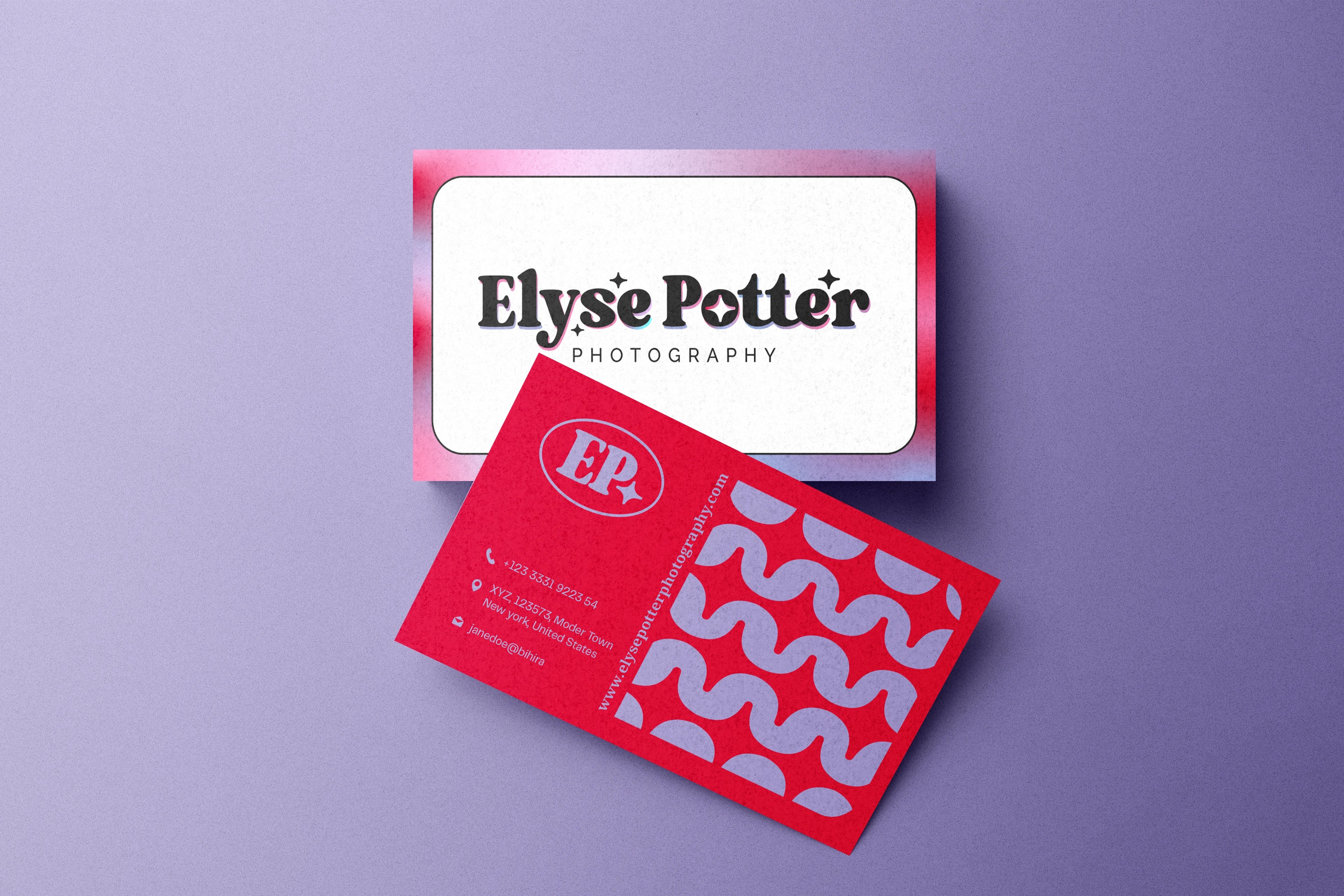 Elyse Potter Photography business cards on a violet ground — a white wordmark card beside a red card backed with the brand's wave pattern