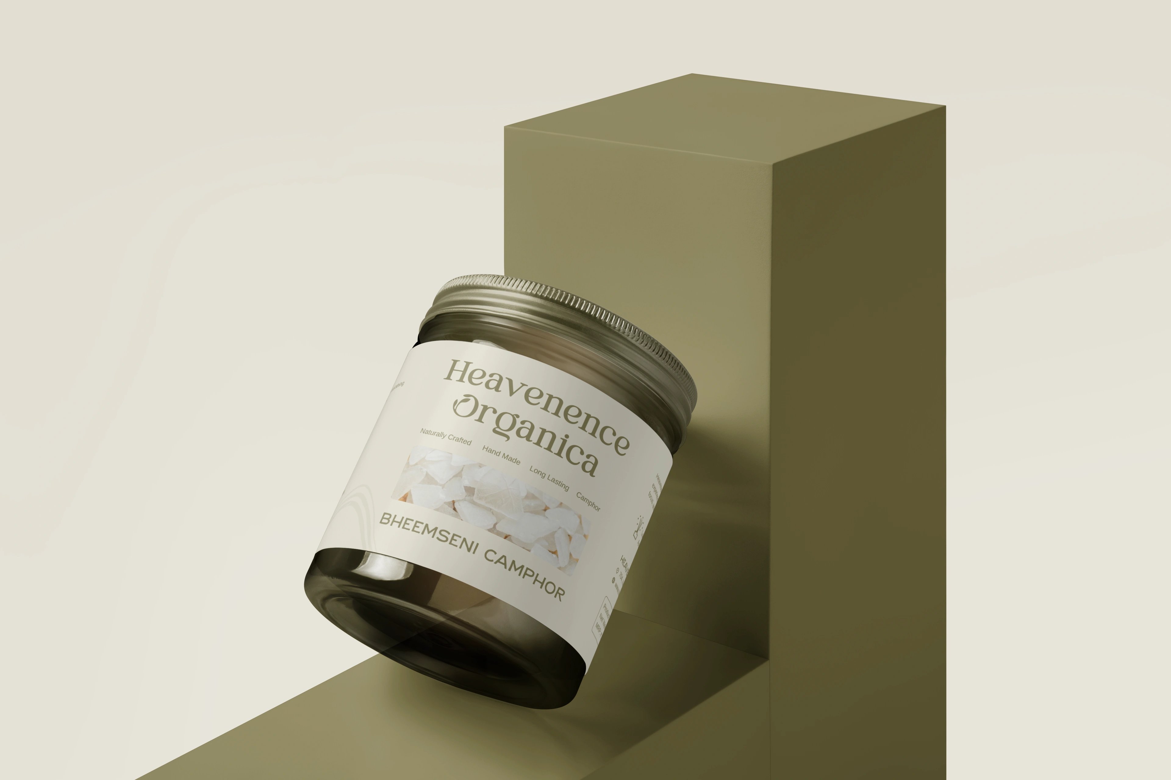 Heavenence Organica Bheemseni Camphor in a cream jar balanced on an edge