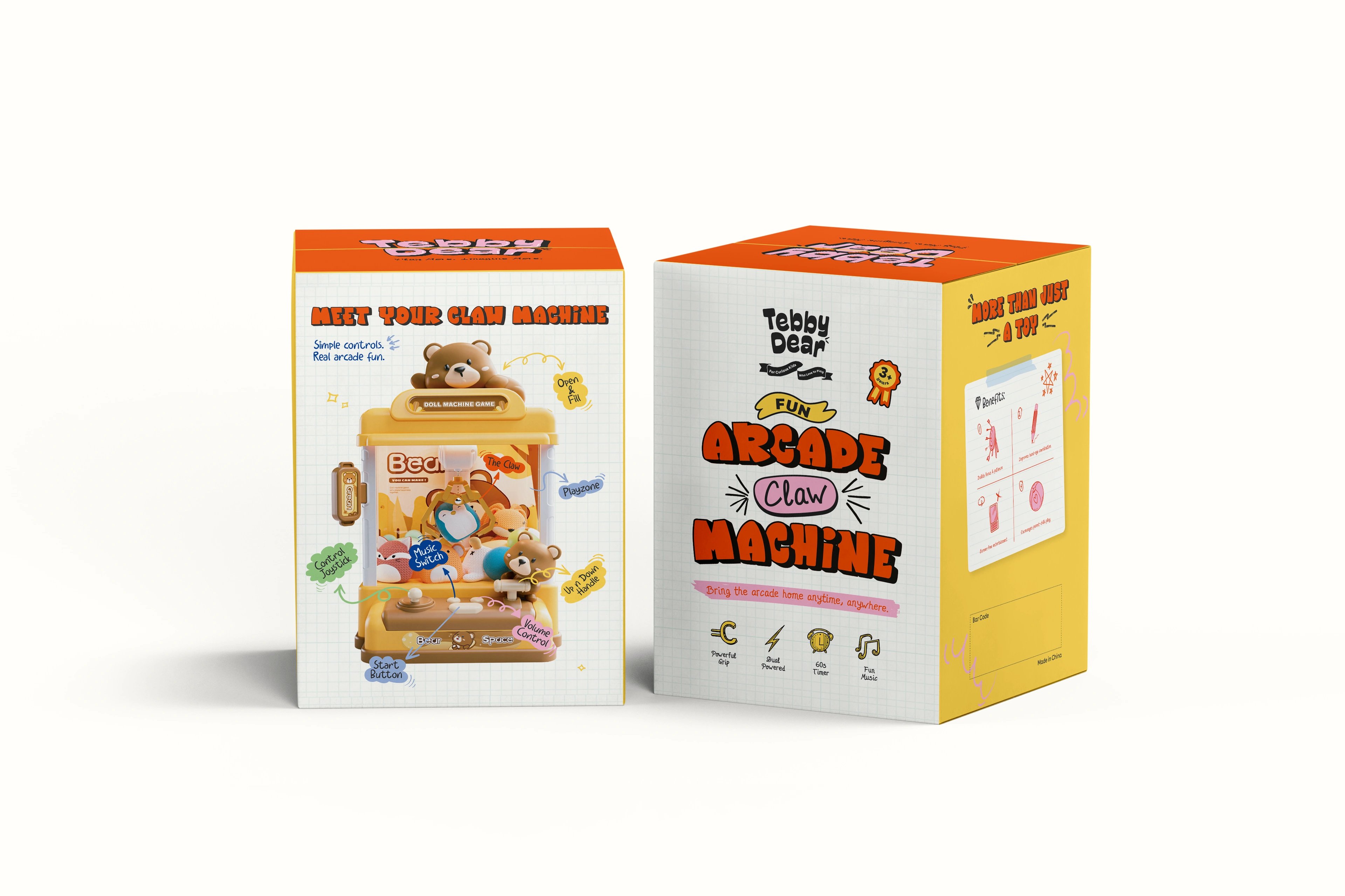 Two Tebby Dear boxes angled together on white, showing the front and arcade-claw-machine faces