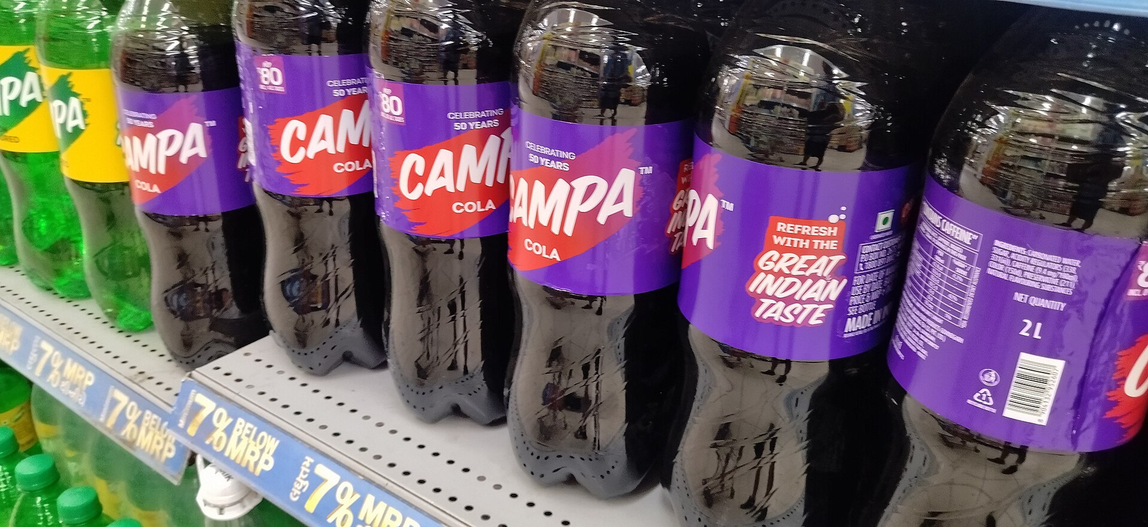 Campa Cola bottles on a Reliance Mart shelf after the 2023 relaunch