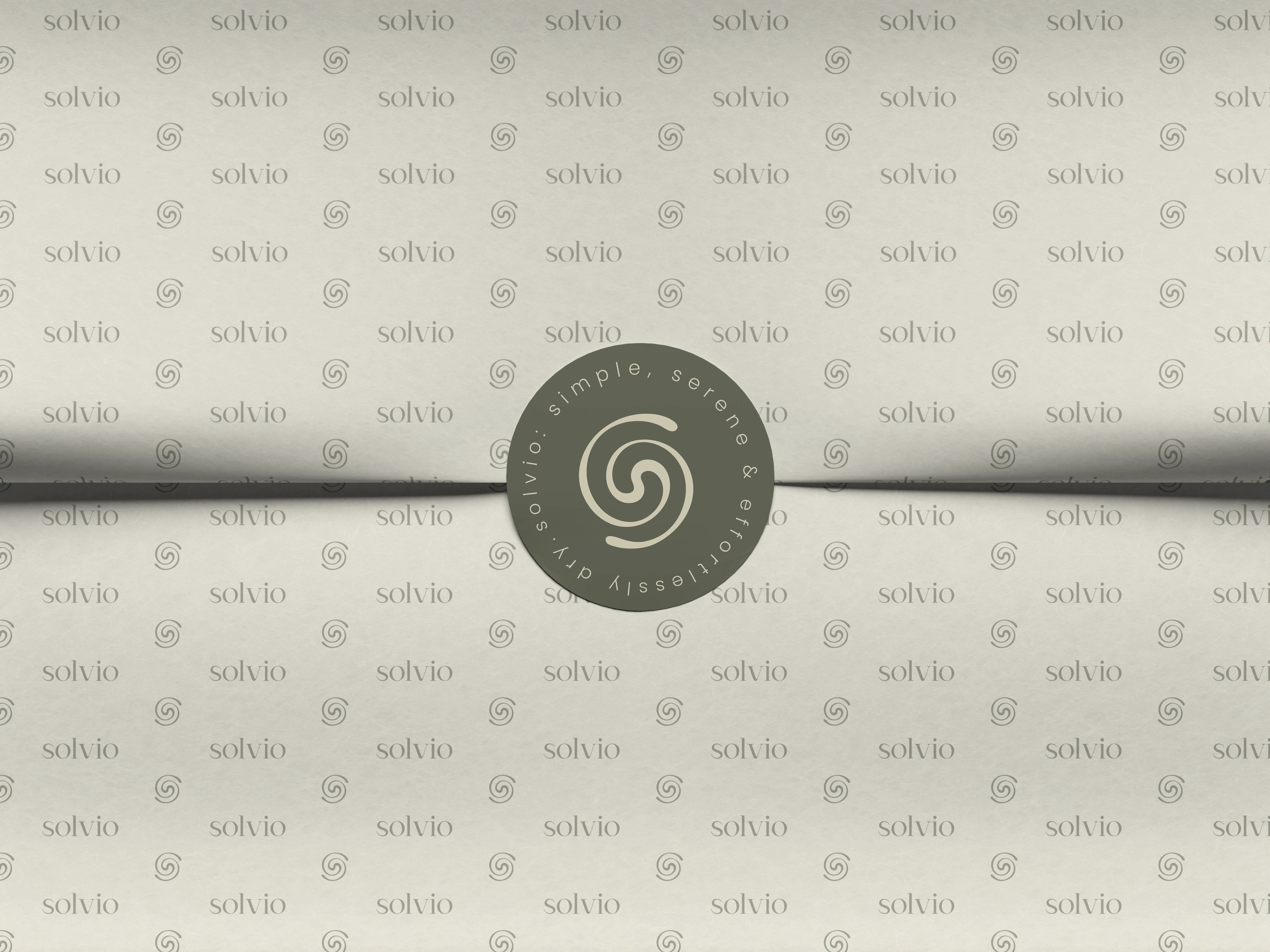 Solvio branded tissue-paper wrap sealed with a spiral logo sticker