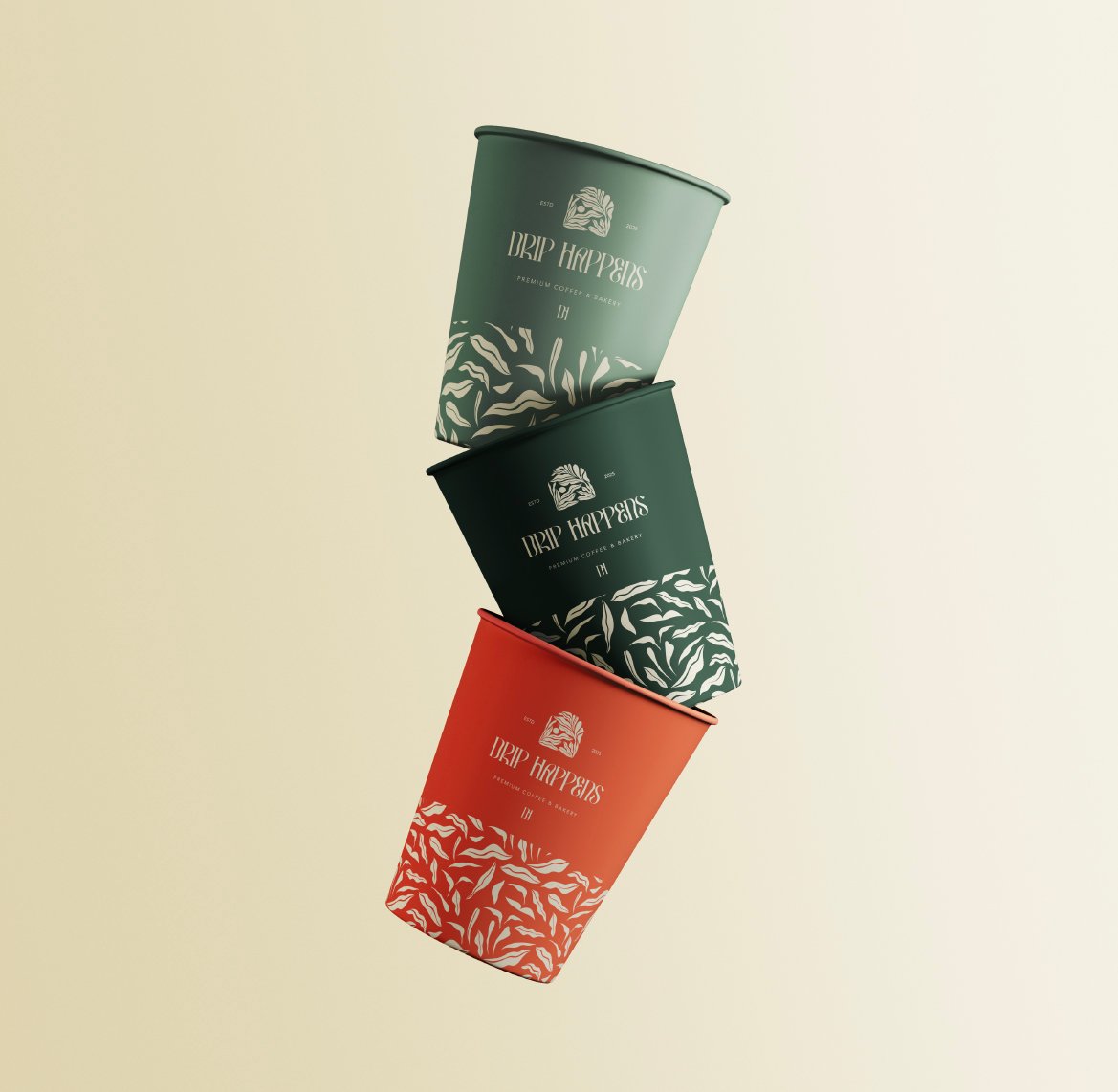 Drip Happens Ethiopia Guji coffee bag resting on a bed of dark roasted beans