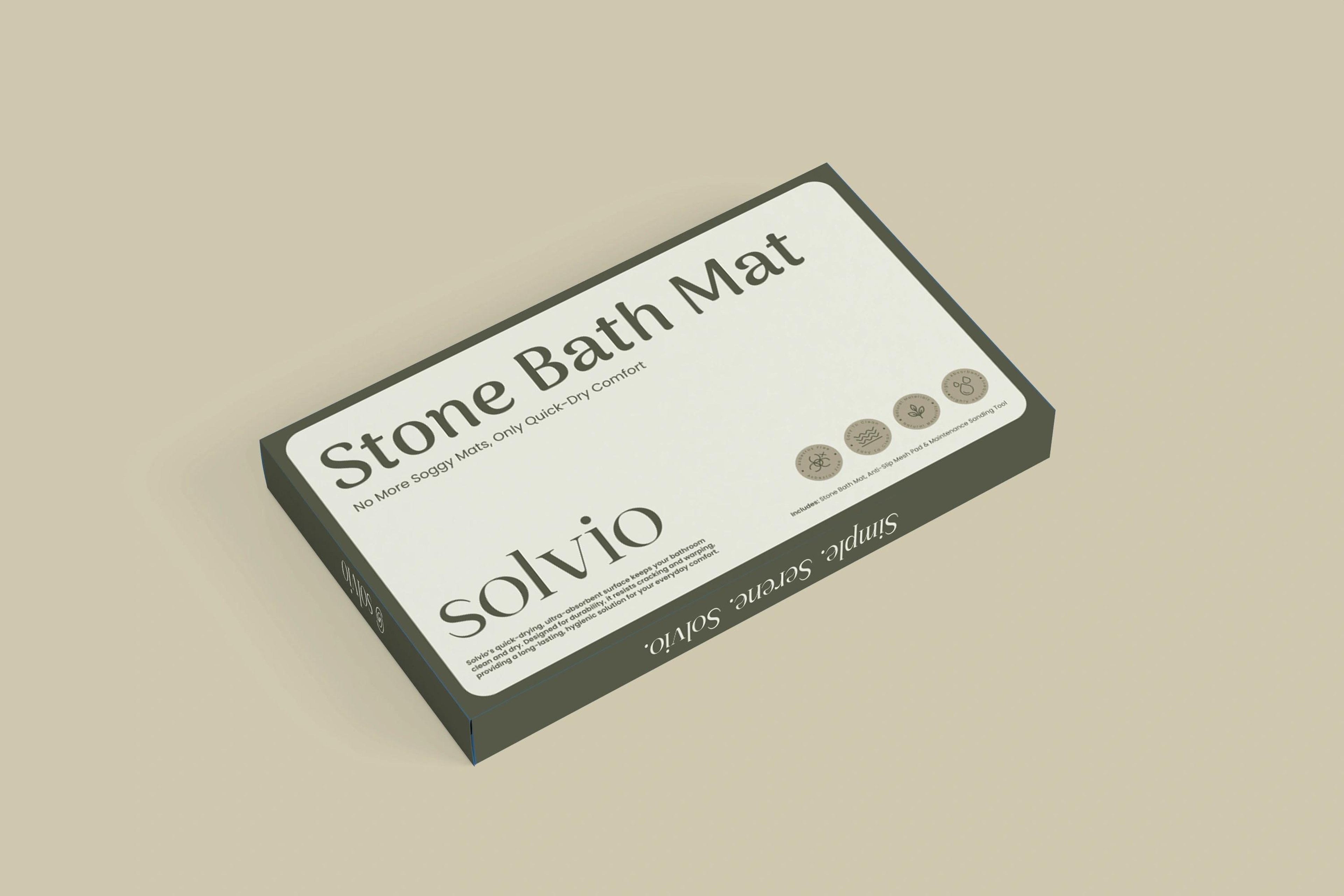 Solvio Stone Bath Mat box, front angled on a warm taupe backdrop