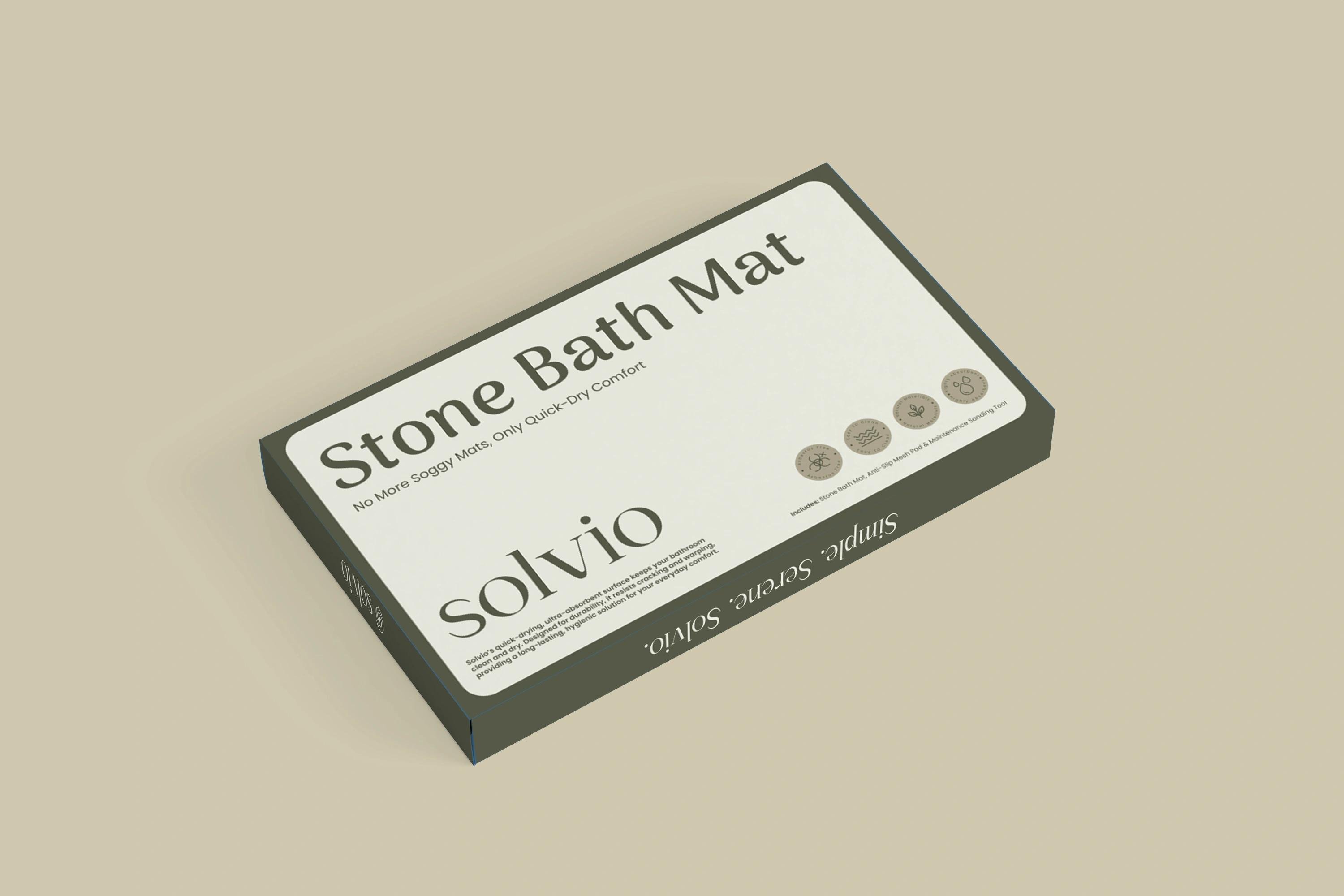 Solvio Stone Bath Mat box, front angled on a warm taupe backdrop