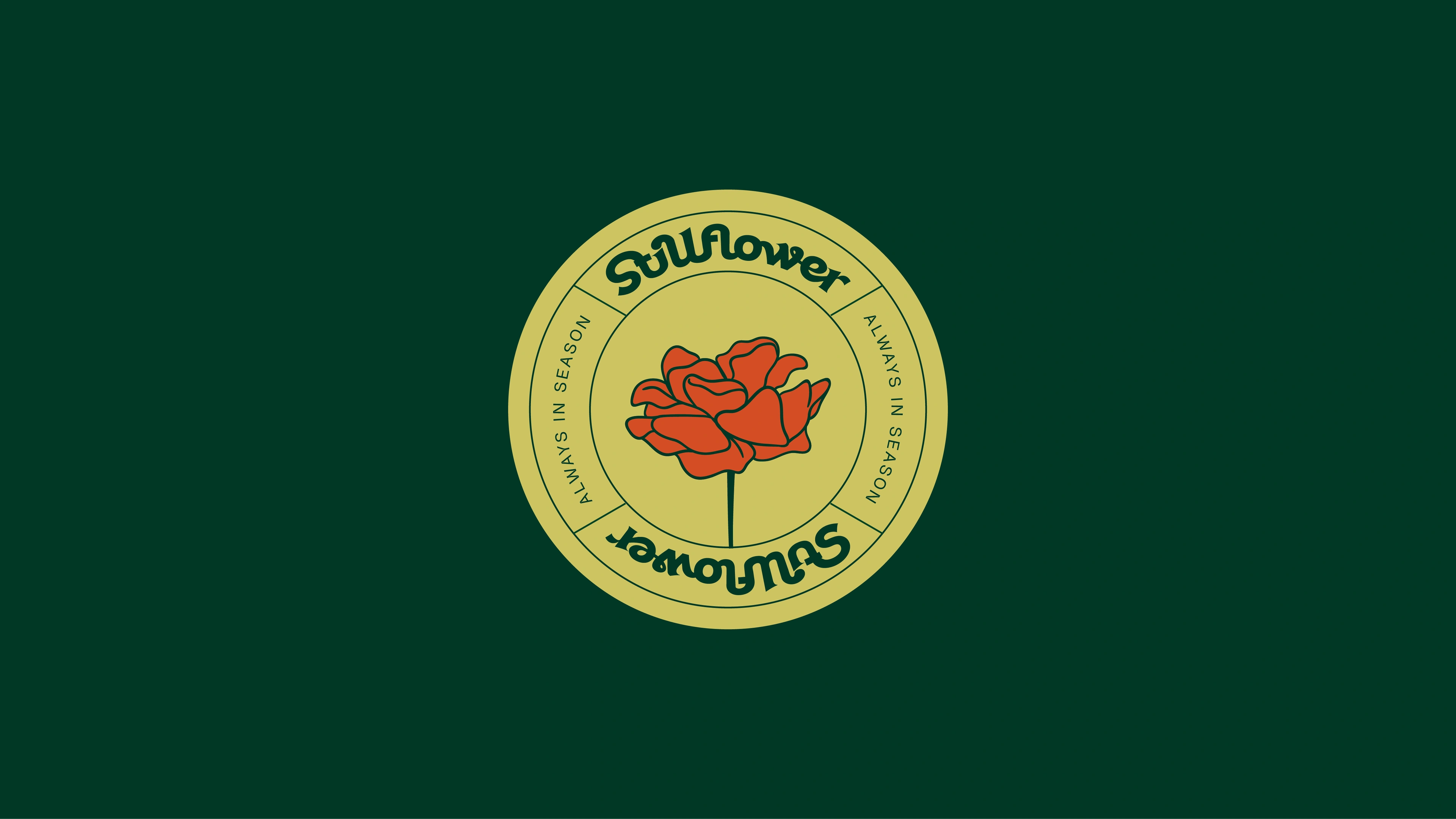 Stillflower circular submark badge reading Always in Season with a pressed rose on green