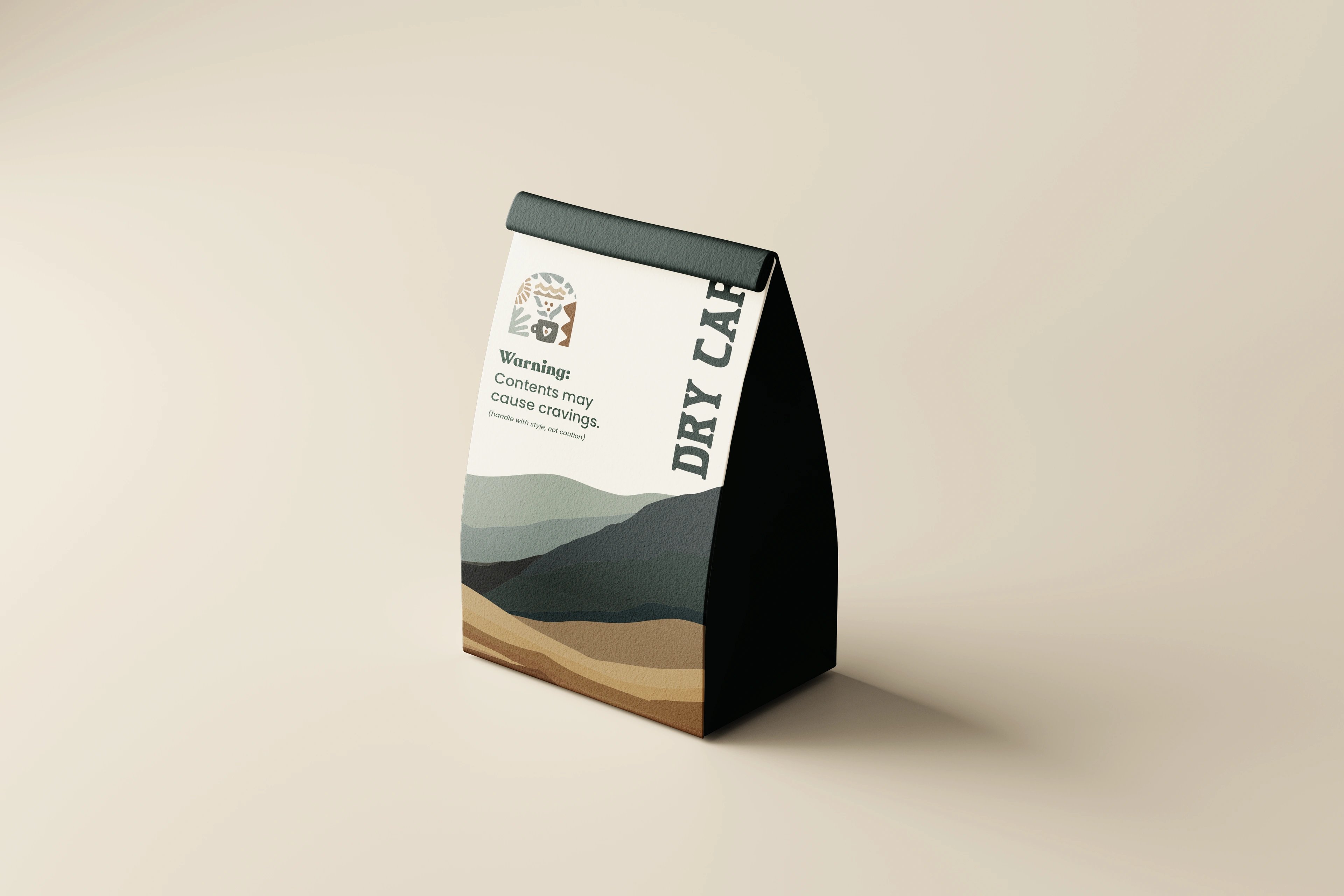 A single Dry Café coffee bag standing, with the layered-mountain design