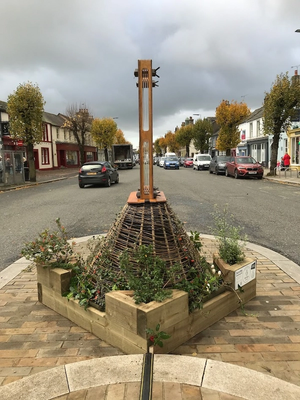 Sculpture in the middle of a road