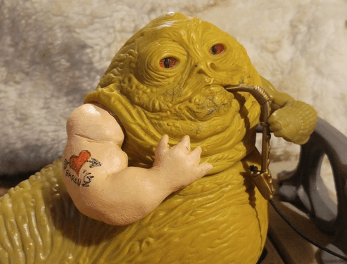 Shot of Jabba's arm and tattoo