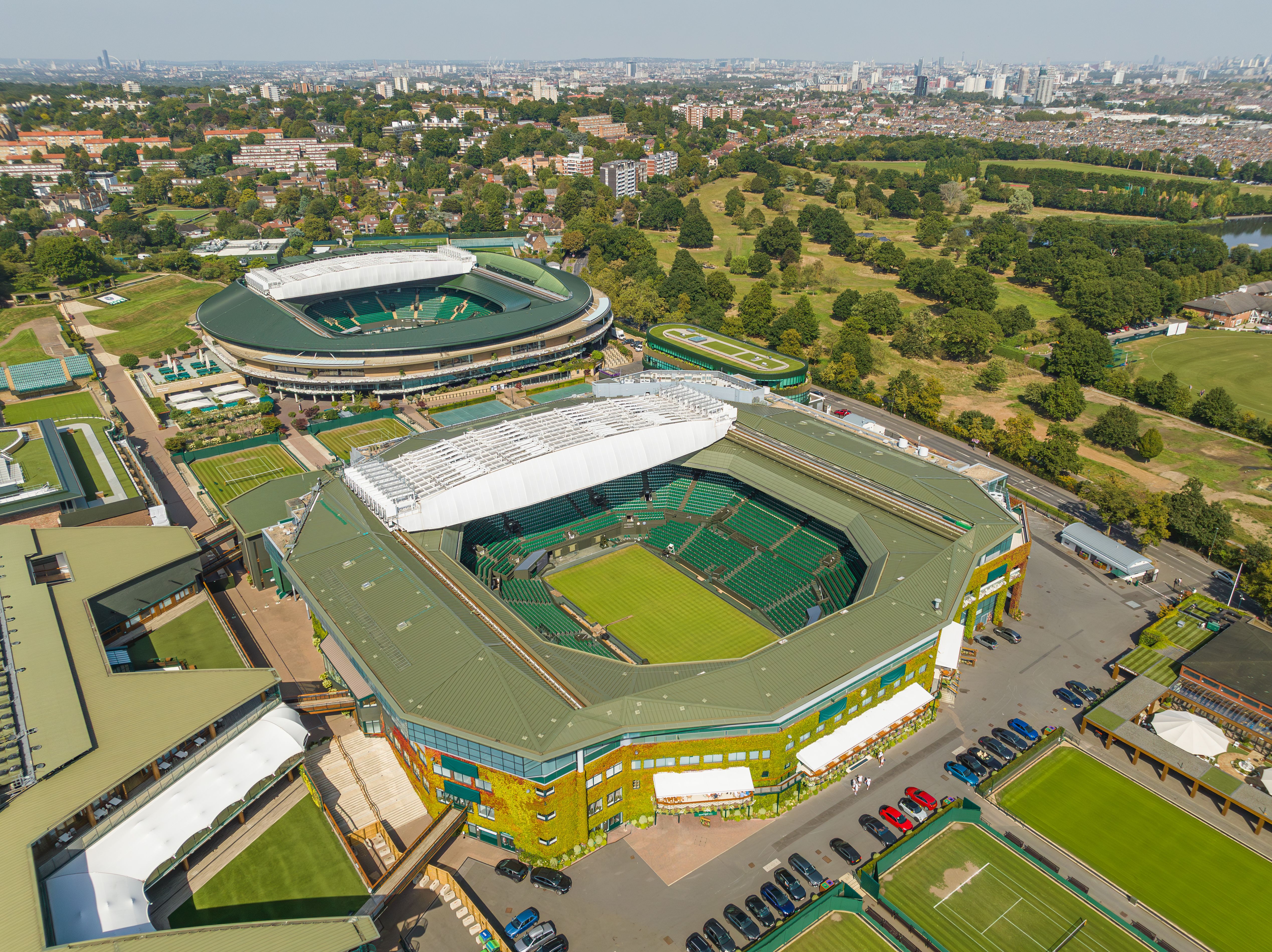 Aerial view of Centre Court and No.1 Court, surrounded by grass courts