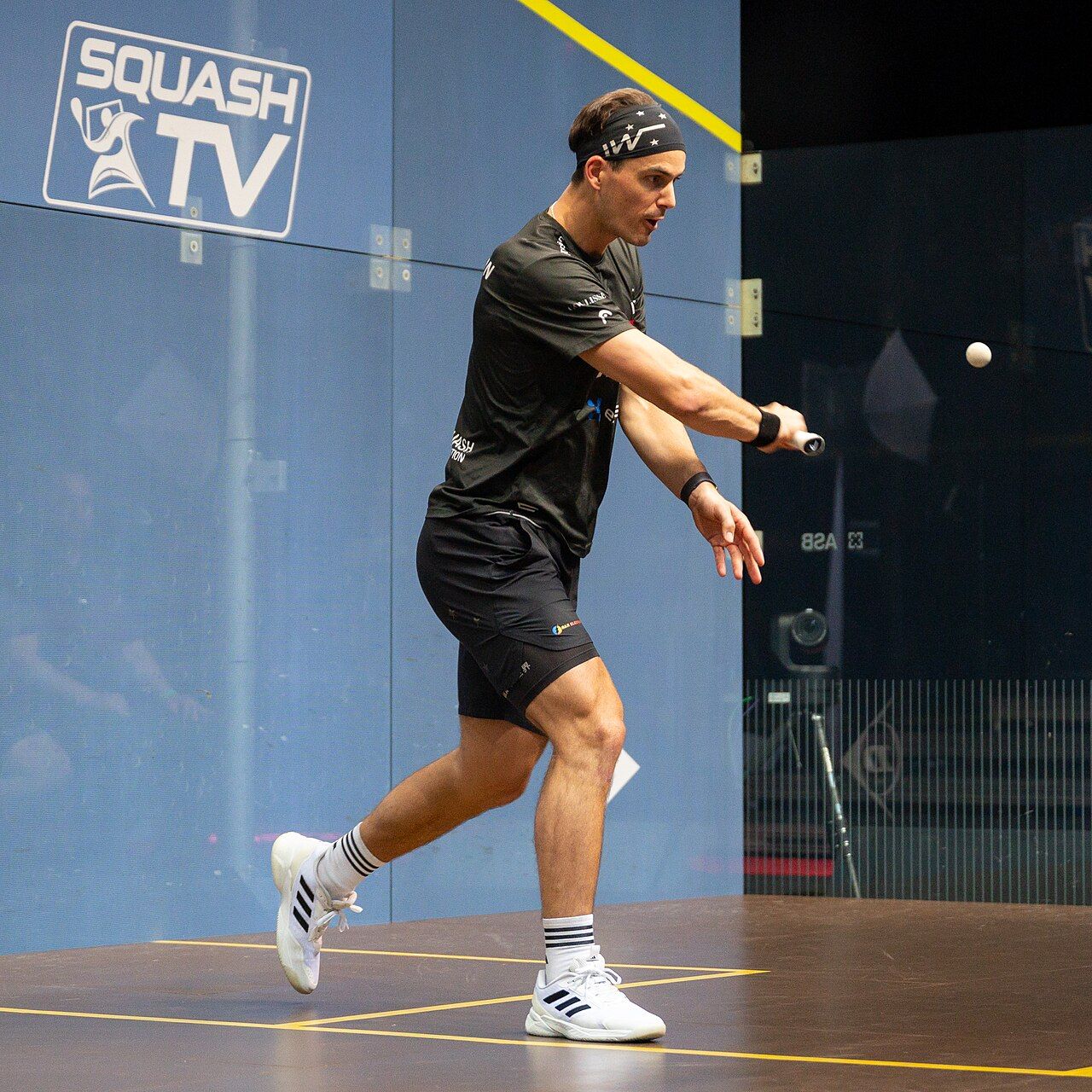 Paul Coll playing squash at the 2023-24 PSA World Tour Finals
