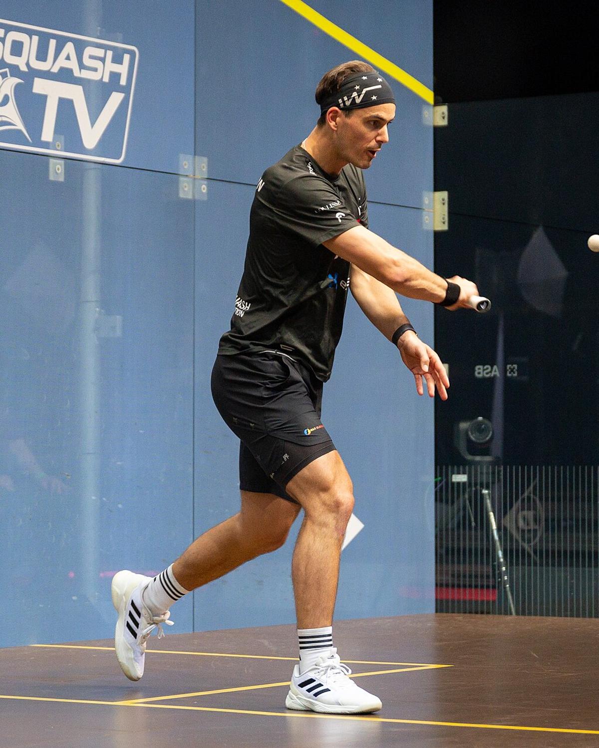 Paul Coll playing squash at the 2023-24 PSA World Tour Finals