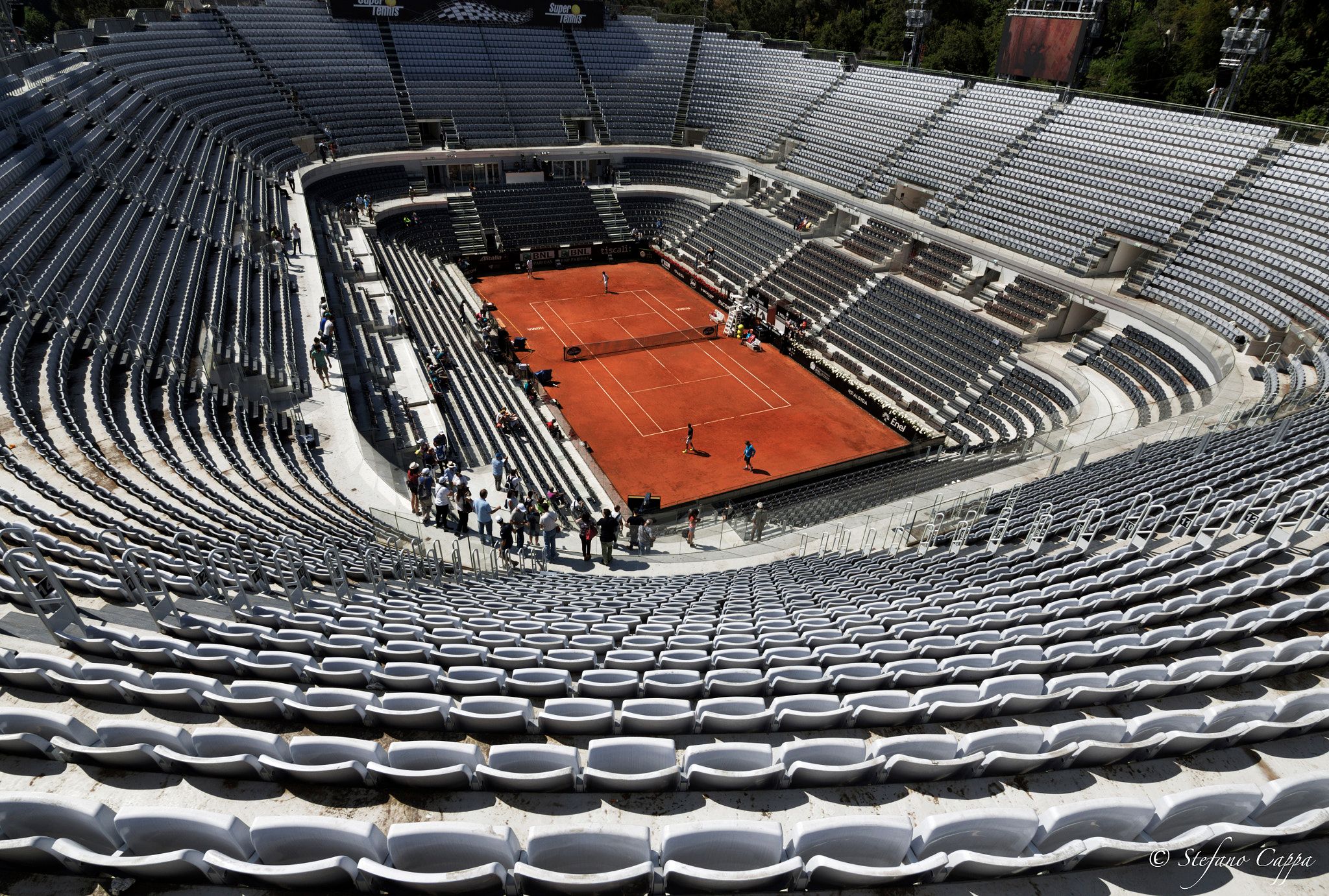 The clay centre court at the Foro Italico seen from high in its largely empty stands