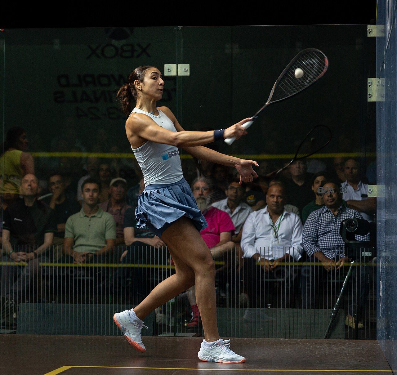 Hania El Hammamy playing squash at the 2023-24 PSA World Tour Finals