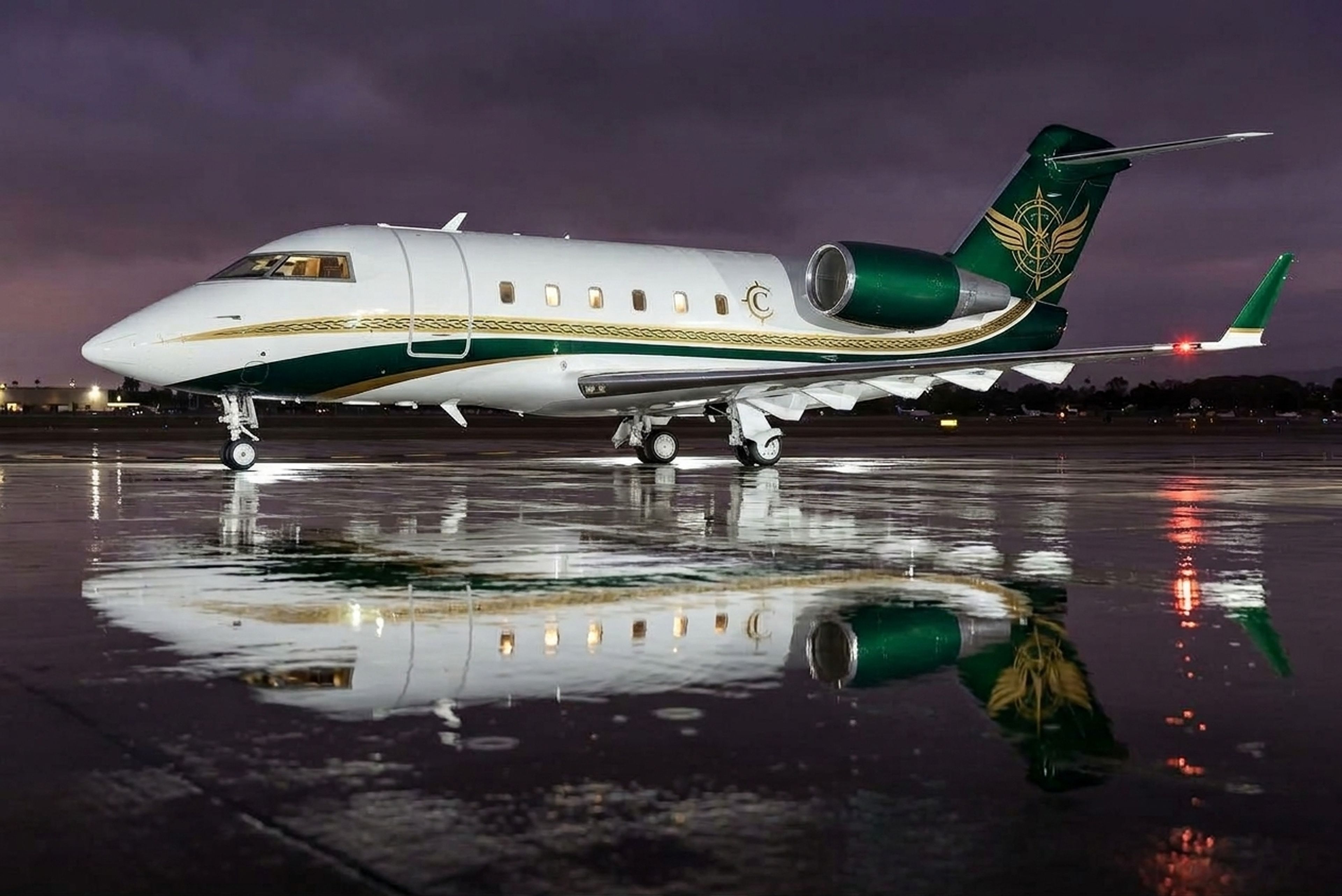 Illustration of a private jet beside an FBO terminal on a wet airport apron