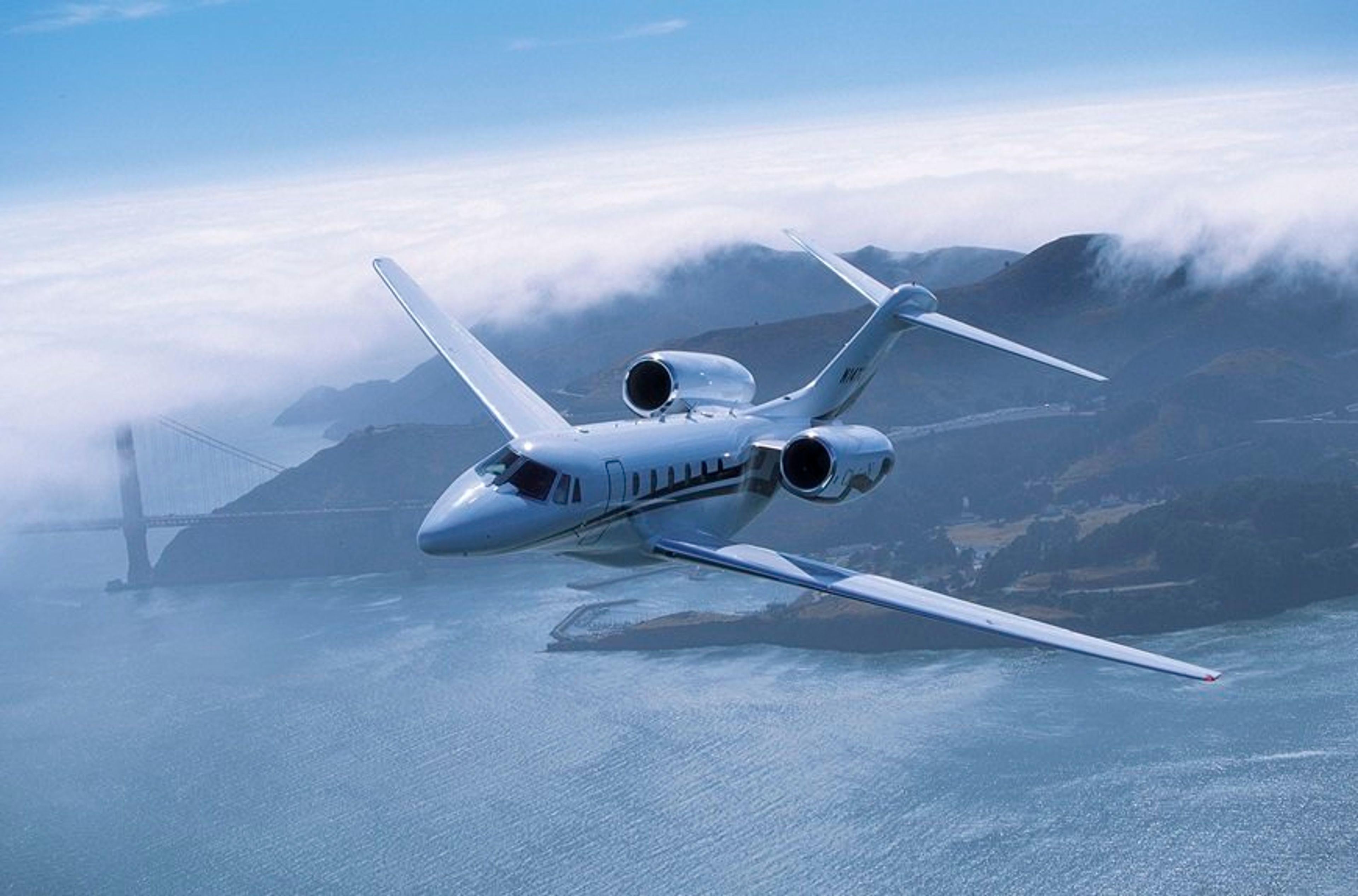 Cessna Citation X flying above the Golden Gate area