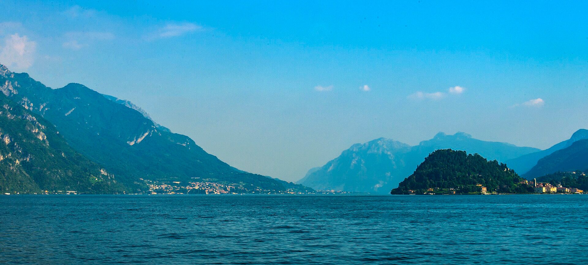 Bellagio and the wooded peninsula on Lake Como, viewed from the water.