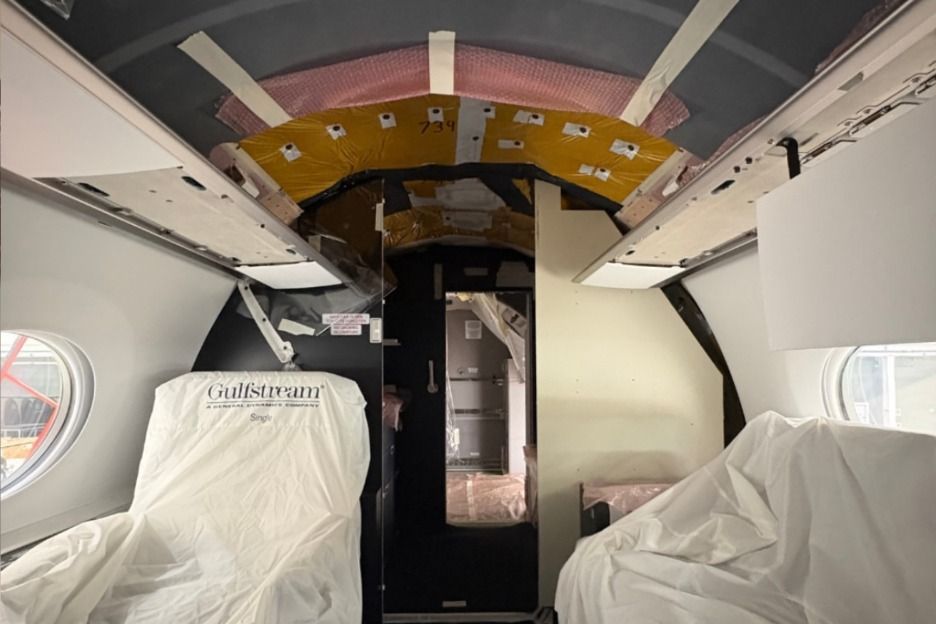 Gulfstream G650ER cabin with ceiling panels removed and seats protected during DC Aviation Group’s ELT-DT installation
