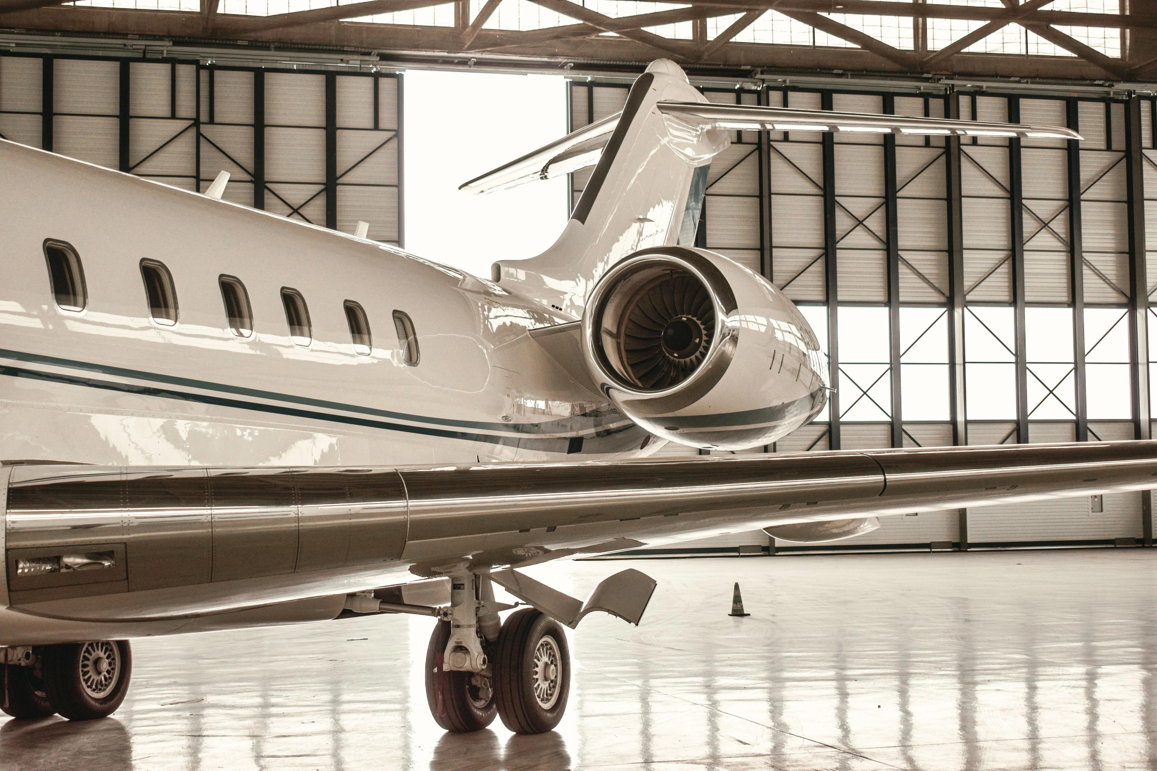 A private jet parked in a hanger